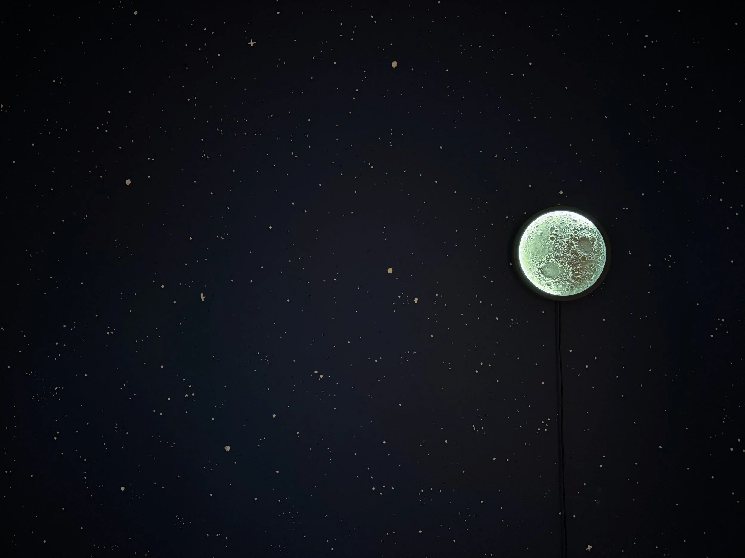 Starry night childrens bedroom with a 3d printed moon reading lamp.
