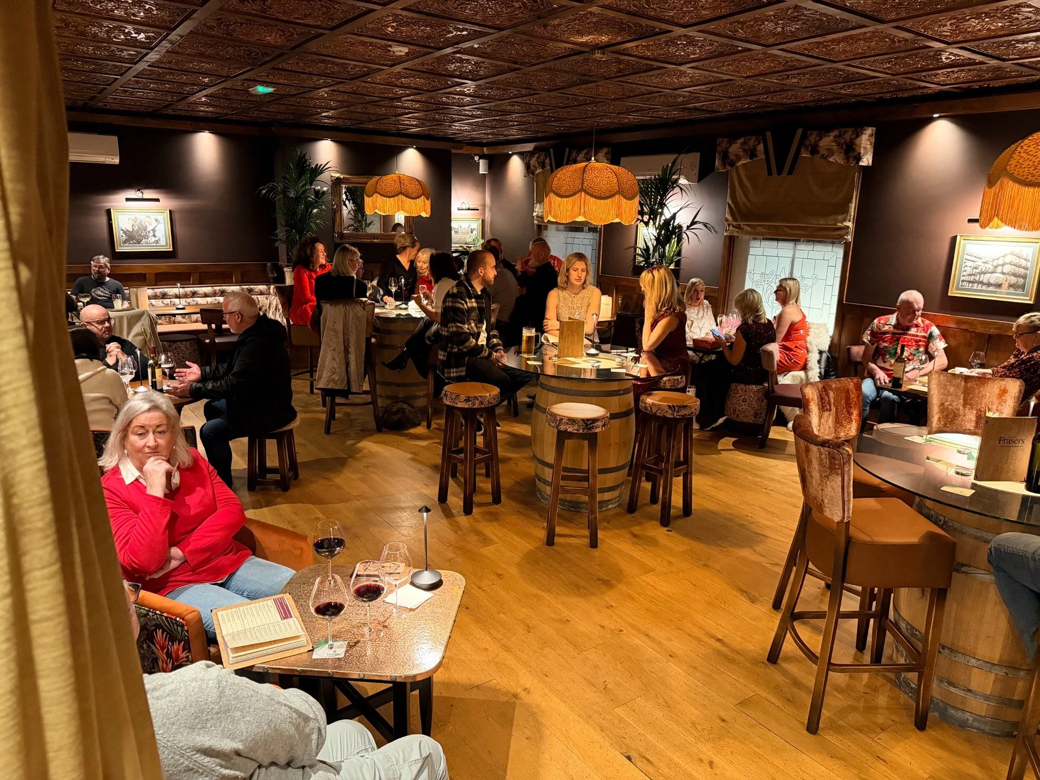 Guests enjoying an evening at Frasers Wine Bar in Burscough