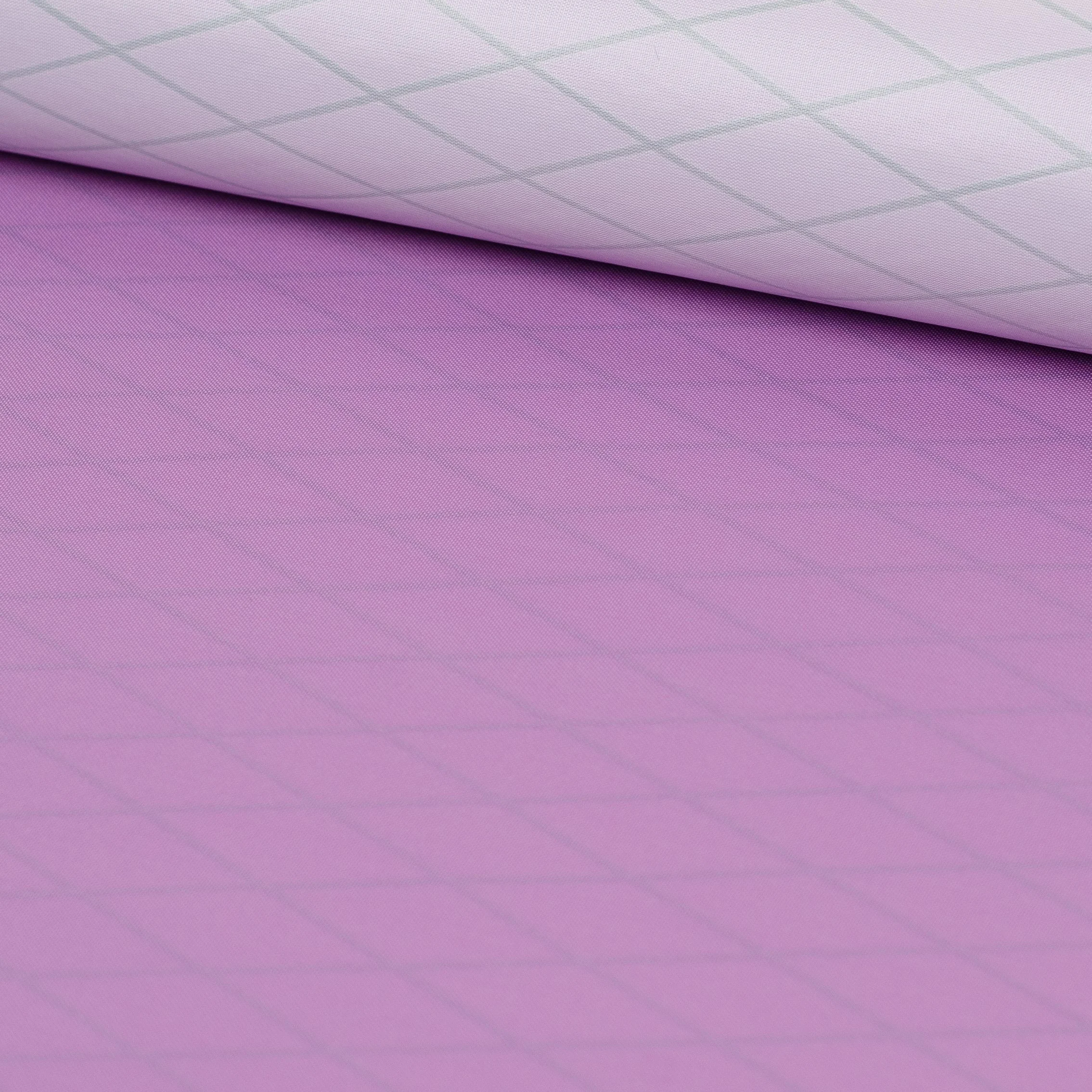 Close-up of a rolled up piece of pink textured fabric.