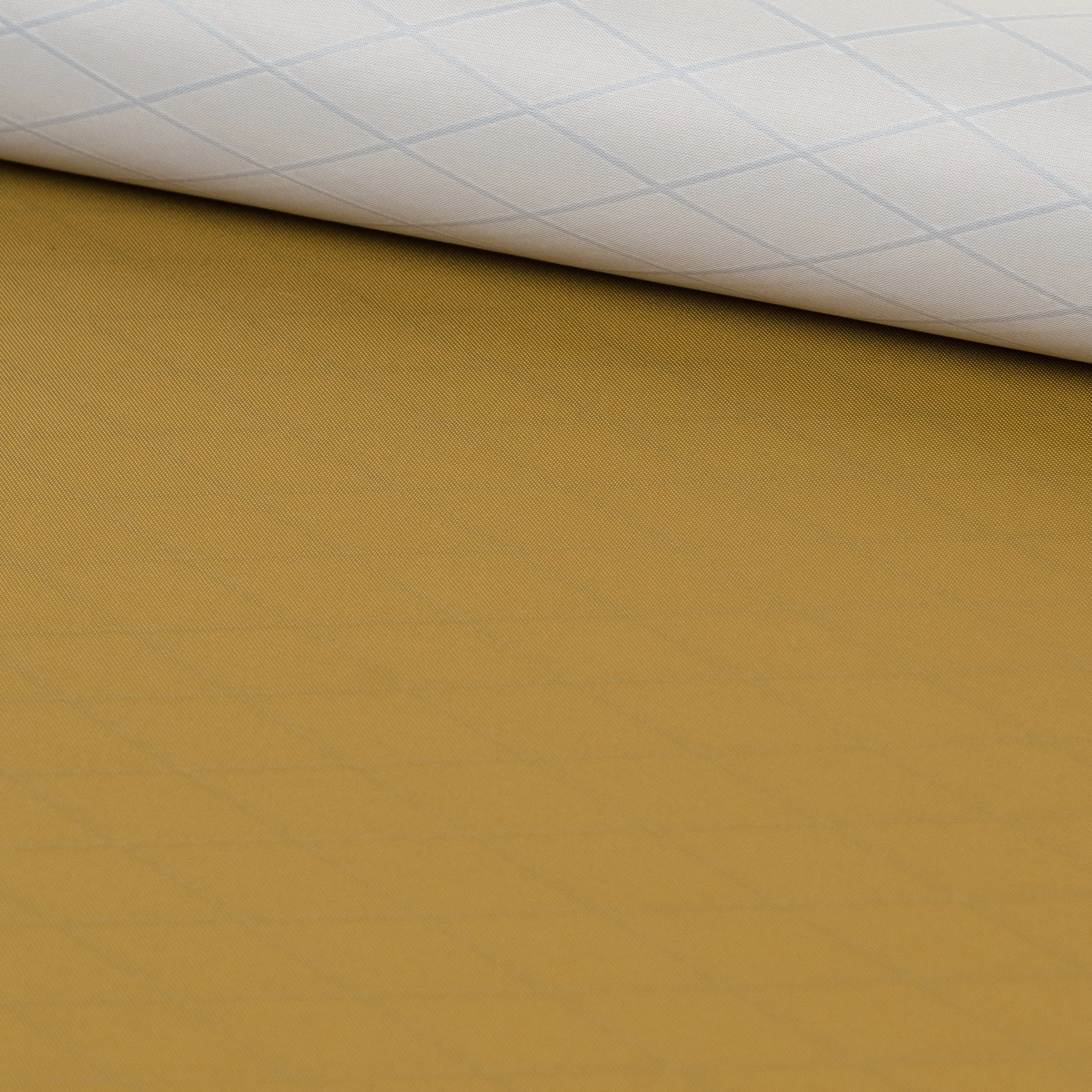 Close-up of a rolled up piece of brown textured fabric.