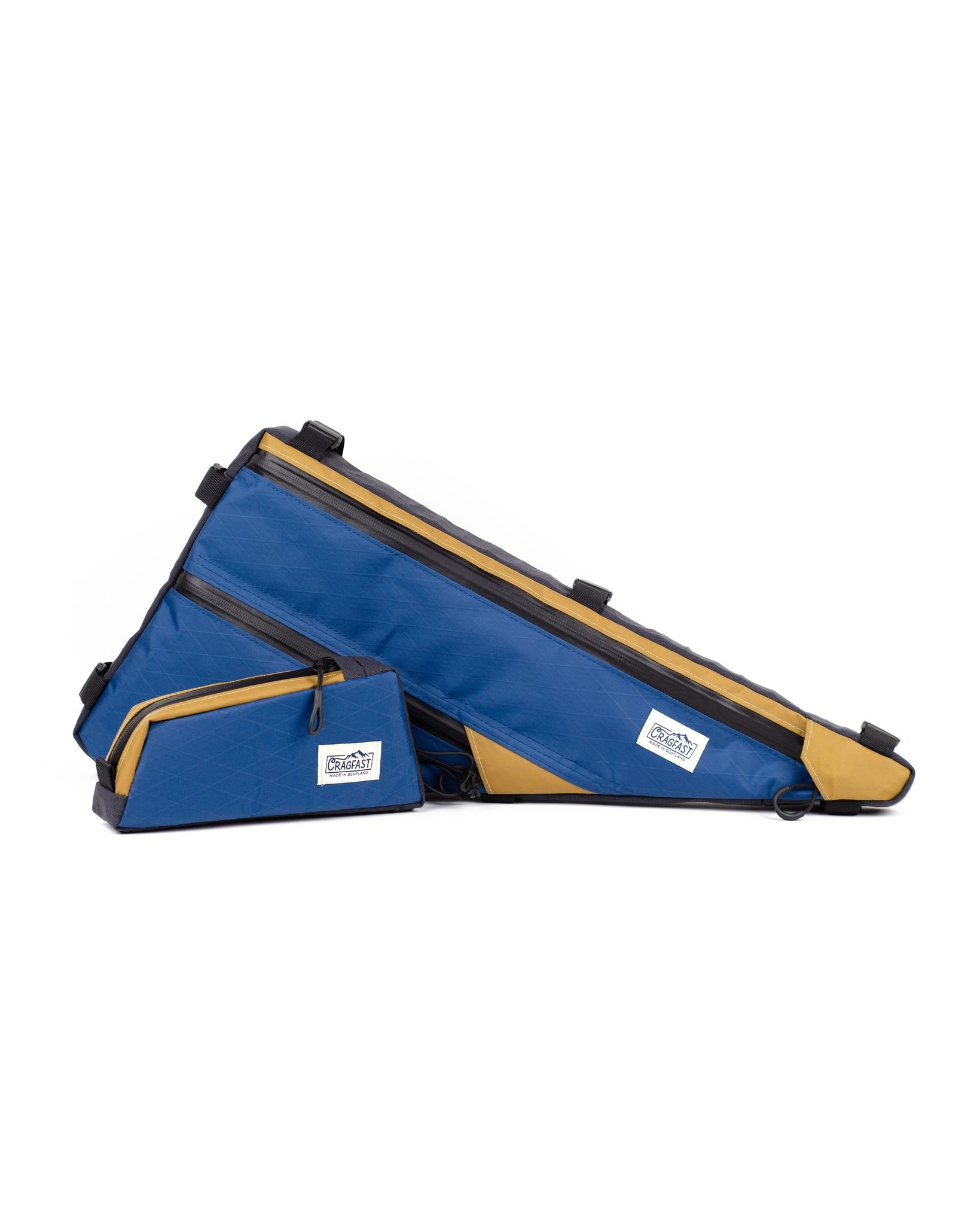 Custom full frame bag and matching top tube bag:

X-Pac VX21 / X11
Blue / Coyote Brown

Removable divider
YKK Aquaguard
Fixed straps

#cragfastgear #madeinscotland #custombikebags #bikepackingscotland #xpac