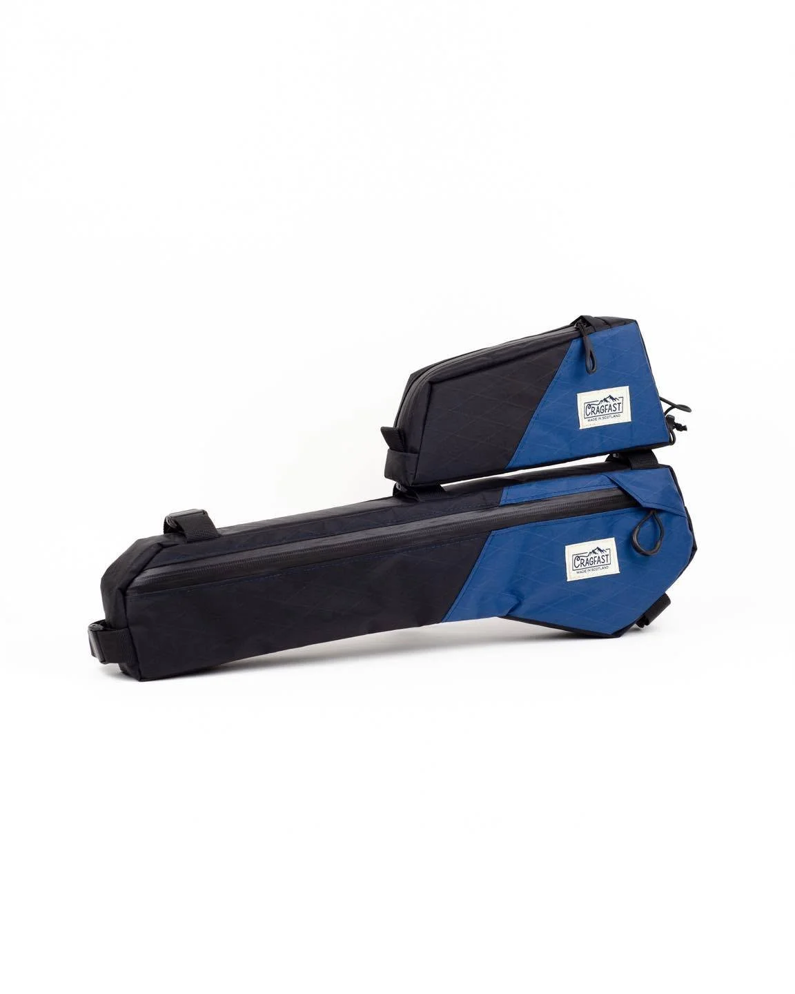 Custom half frame bag and top tube bag for Giant Revolt:

X-Pac VX21 / 210D Nylon
Blue / black / orange

The frame bag features two separate compartments accessed from either side with mesh pockets for organisation.

The top tube bag is a simple bolt