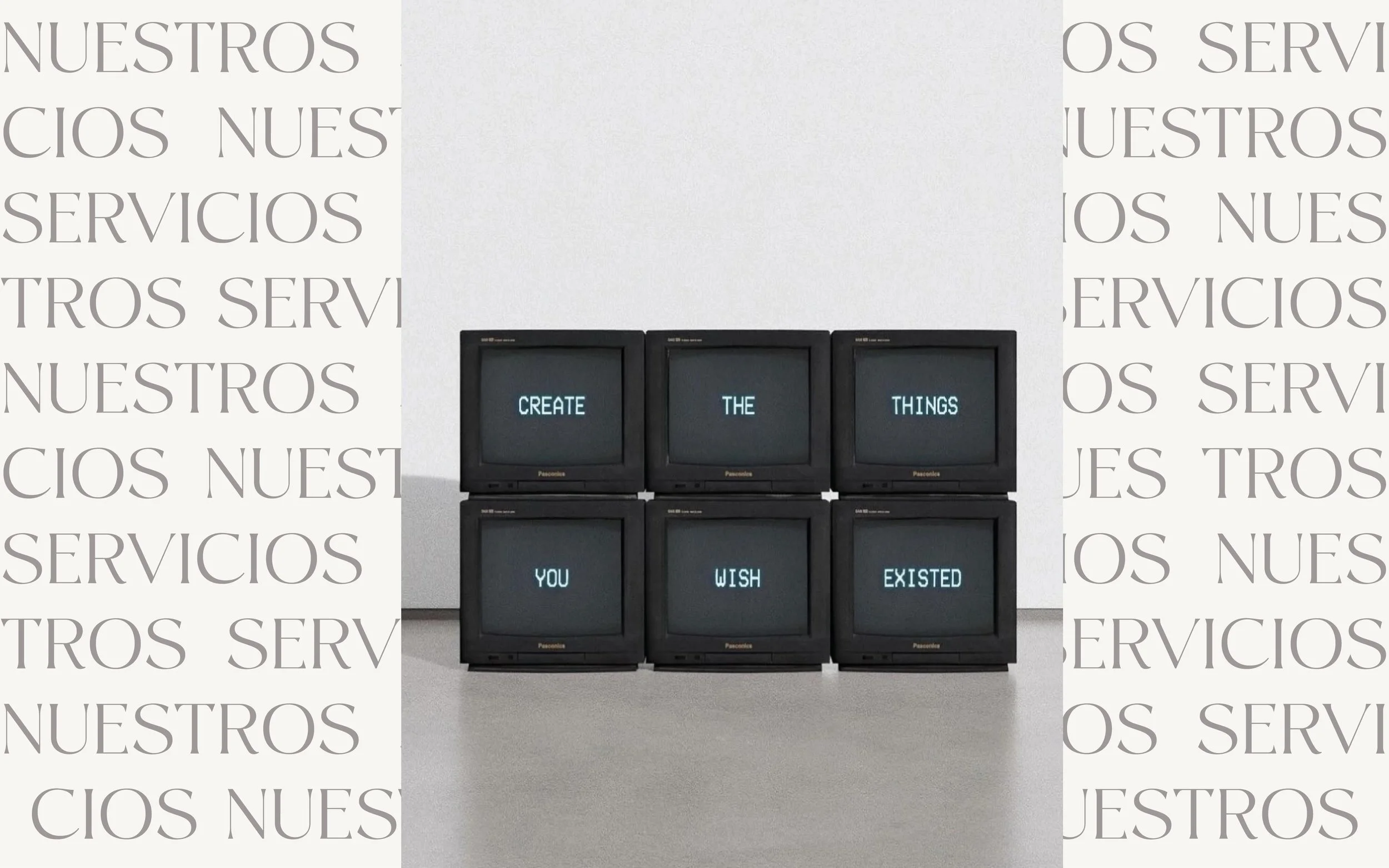 Six vintage black Panasonic monitors arranged in two rows of three, displaying blue text that reads: 'CREATE THE THINGS YOU WISH EXISTED'.