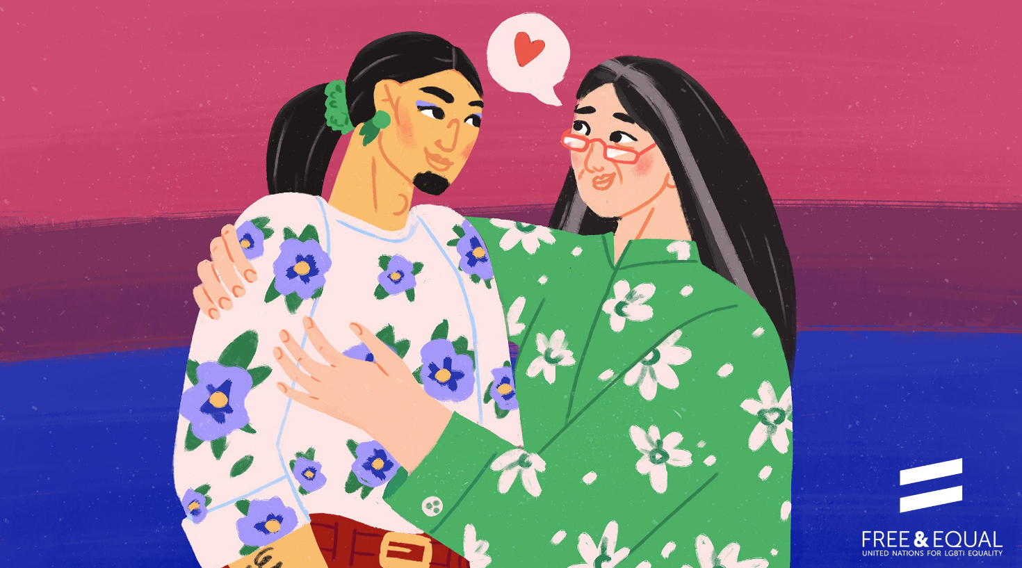 Two women with long dark hair and floral-patterned shirts are embracing each other affectionately, with a pink, purple, and blue striped background. One woman is wearing glasses, and a speech bubble with a heart is above their heads.