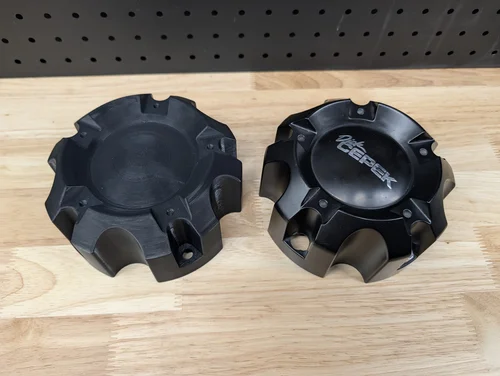 Custom automotive wheel center caps