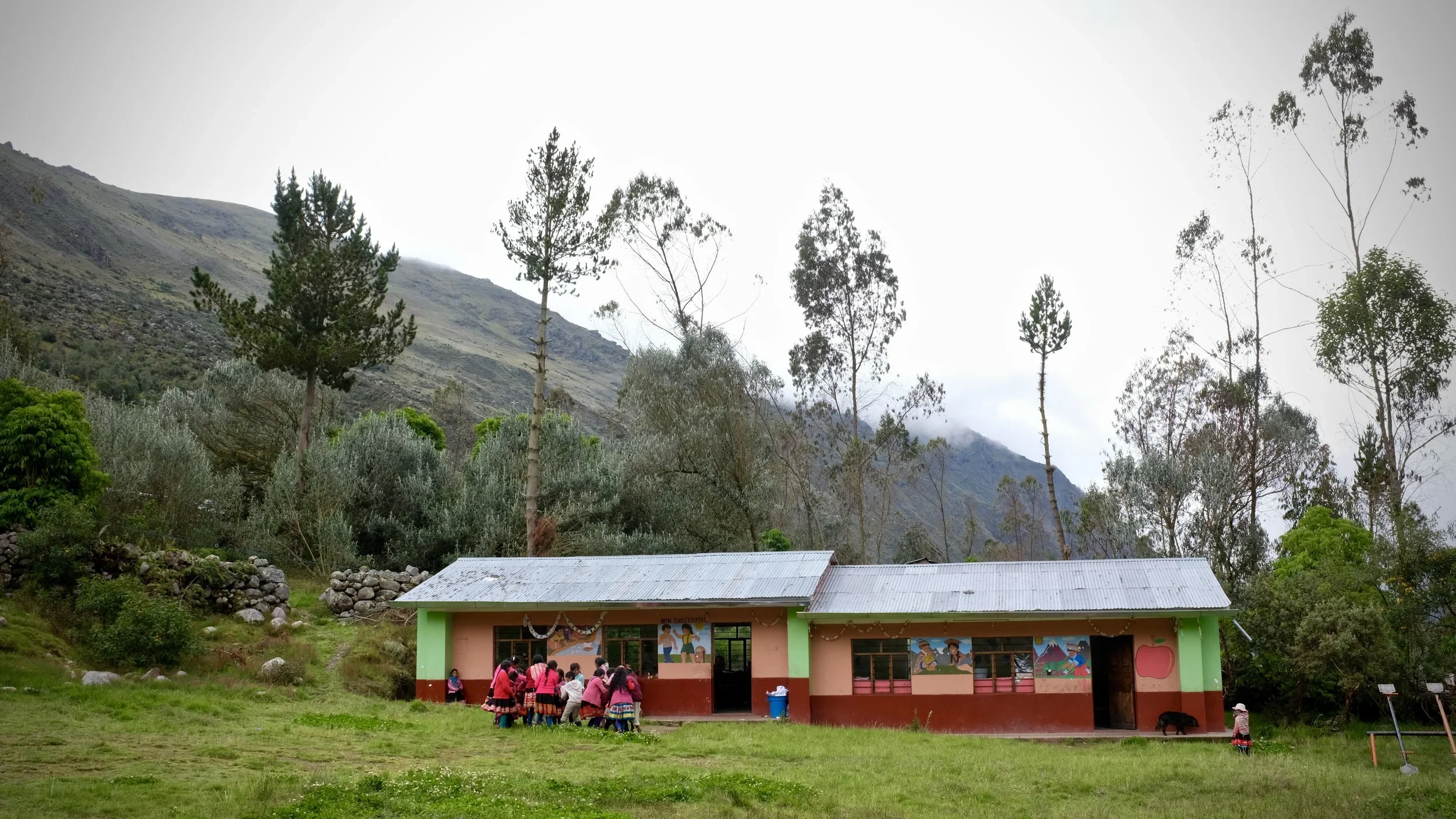 Children enjoy recess at a primary school on the outskirts of the Cuncani village.