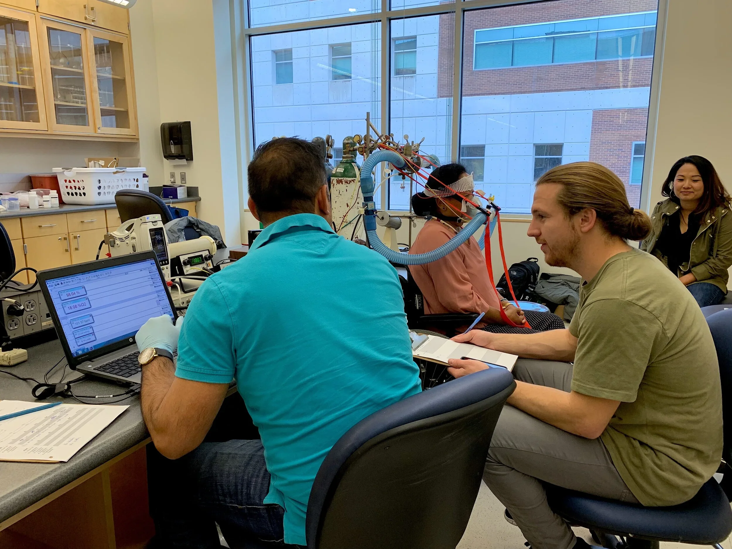 Spencer Brown, a medical student at the University of Utah, assists Esteban Moya in the HVR protocol.