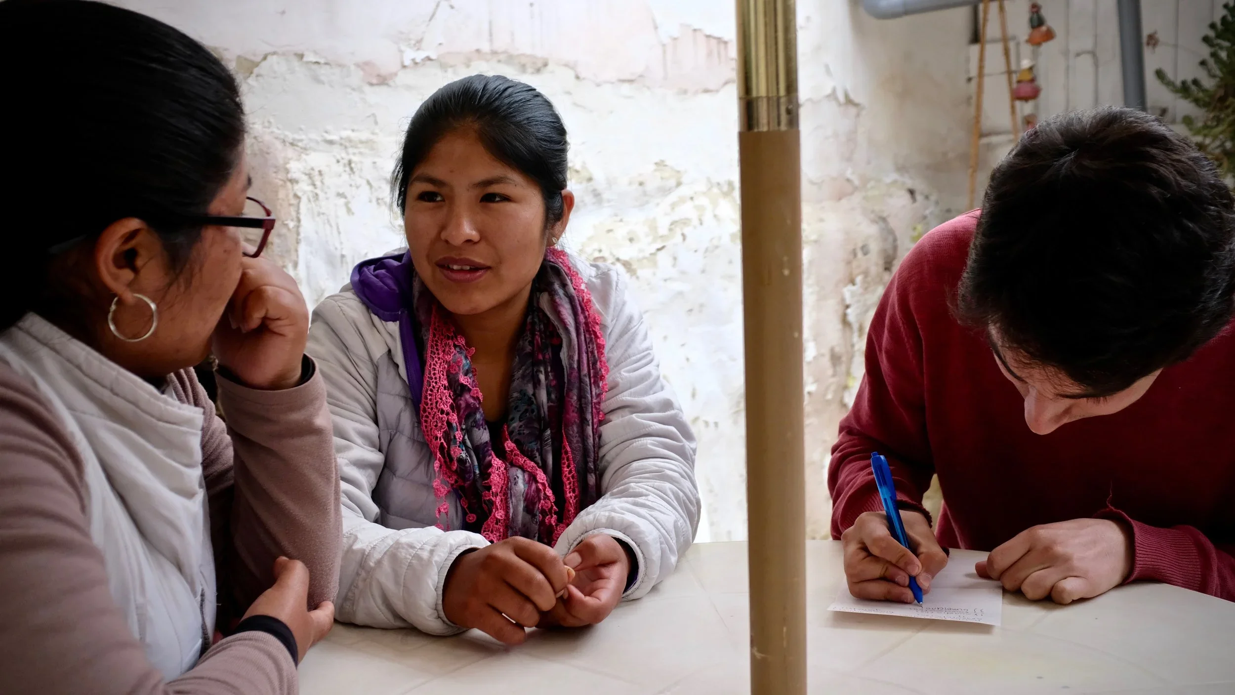 B'Linda and Soledad work with Jacomo, our translator, to trace back and record their extensive family history.