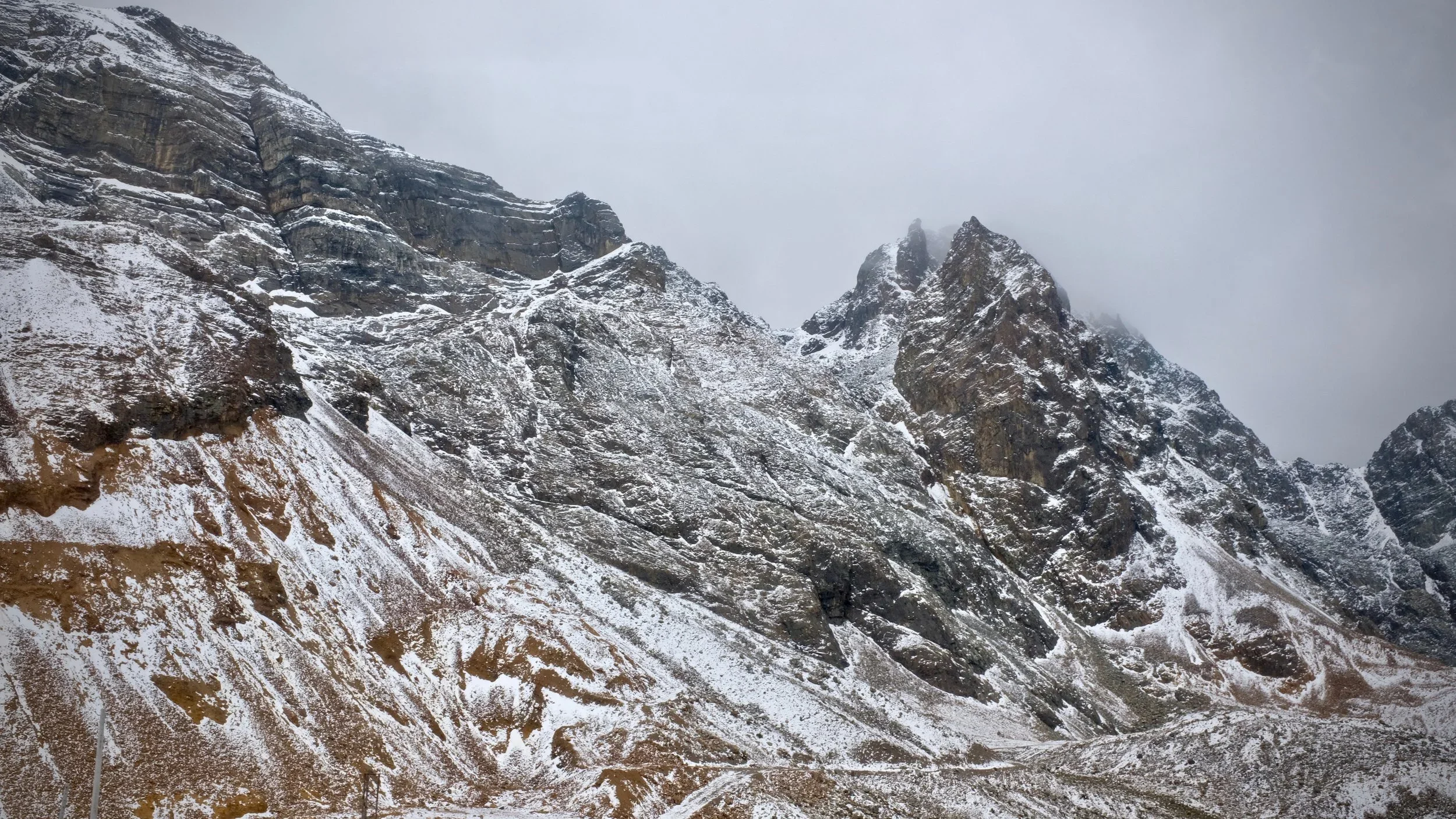 Snow-dusted mountains lined the roads on the way down from Cerro de Pasco, Peru.