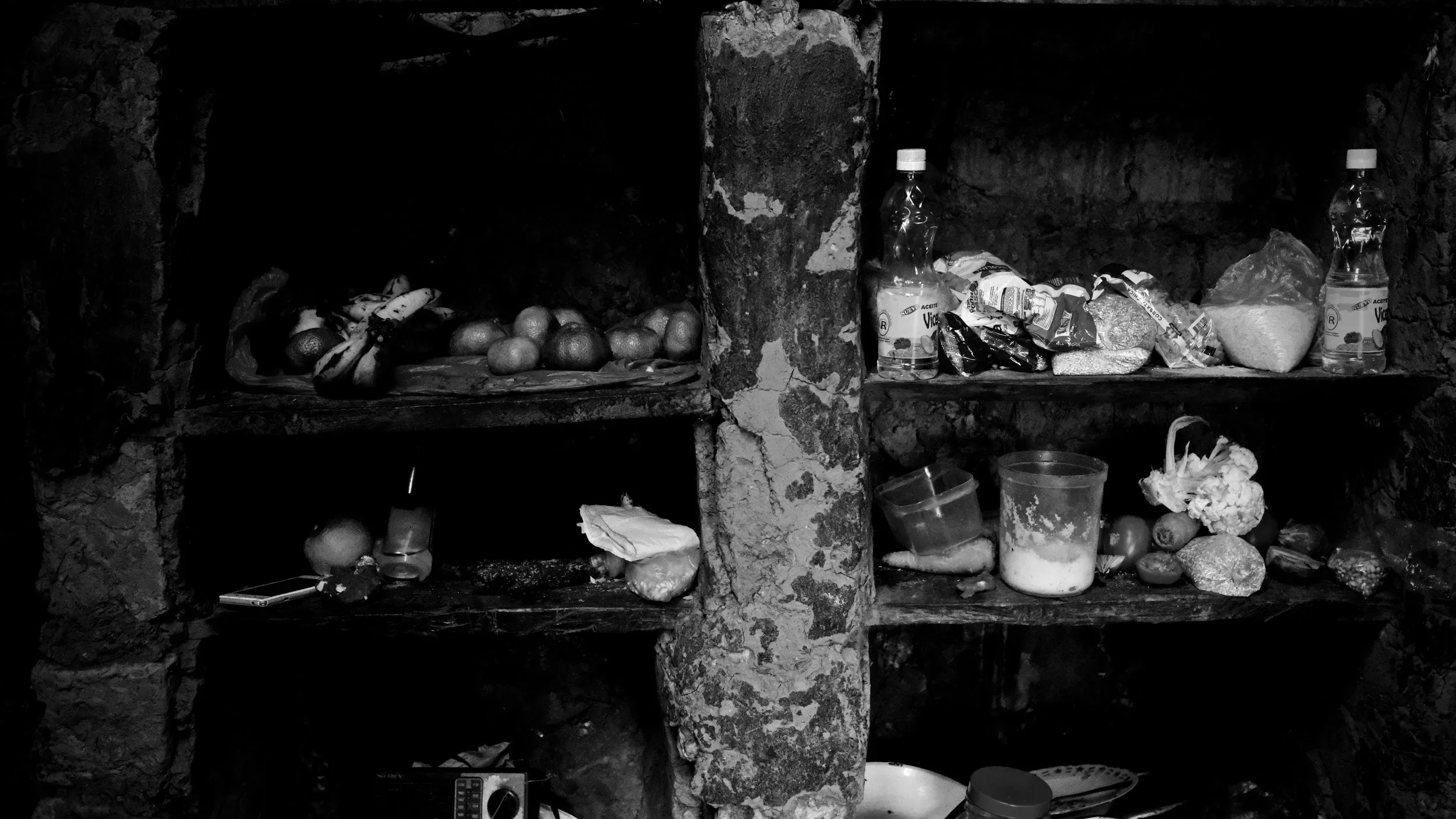 Pantry staples are displayed out in the open in Esteban's home.