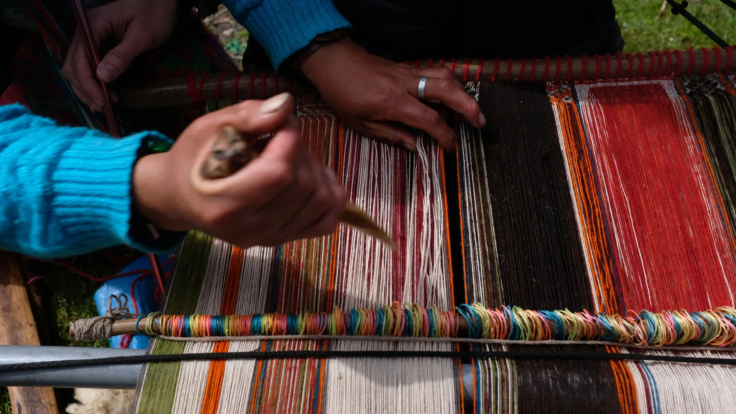 The handicraft's red-orange threads, Ricartina noted, are derived from the crushed bodies of cochinea, an insect found in a local cactus.