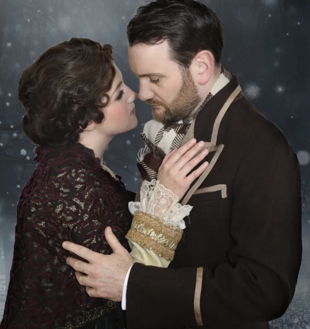 A romantic scene of a man and woman in vintage clothing embracing under a starry night sky.