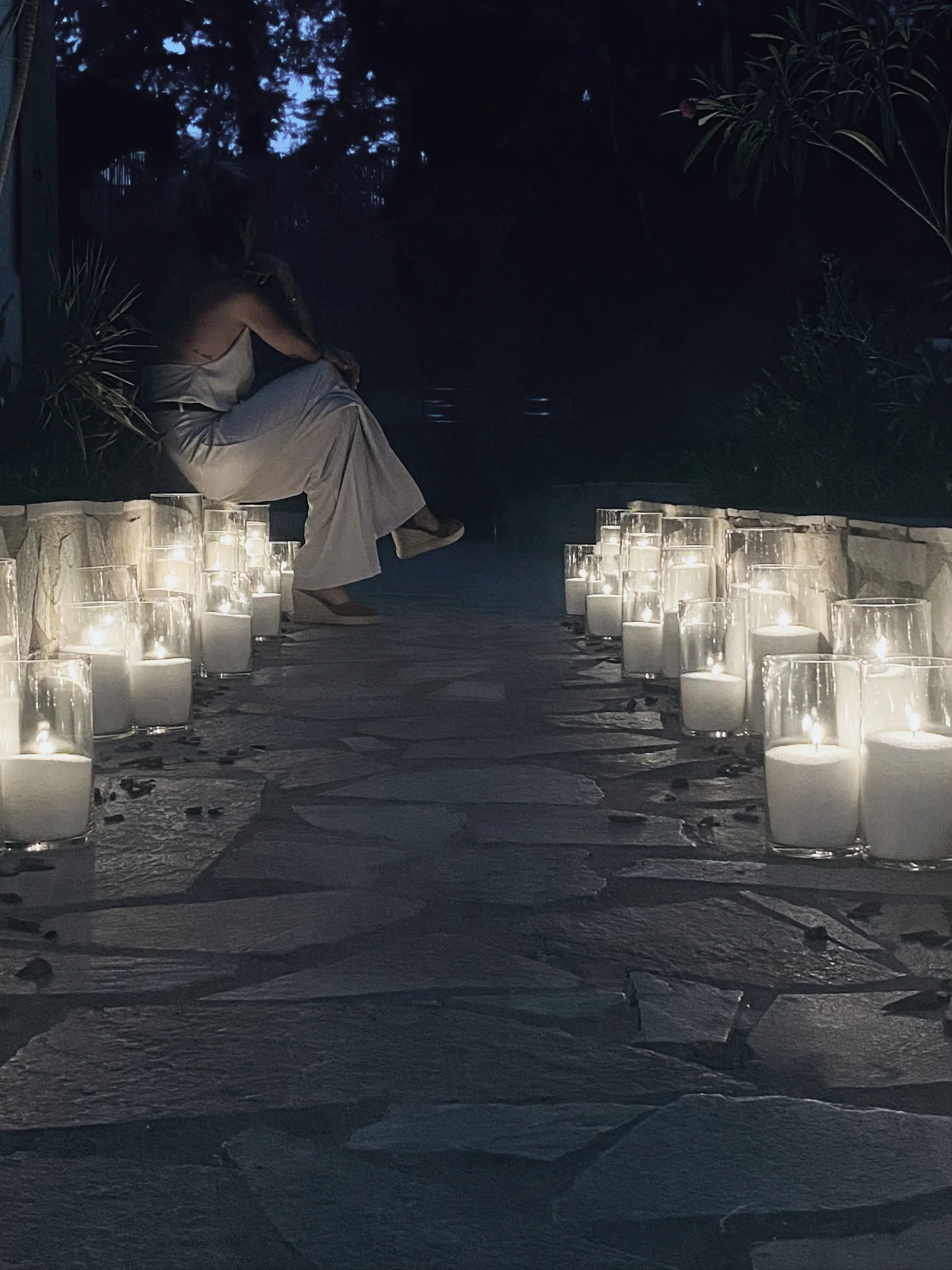 Candles illuminating a path for a wedding decoration