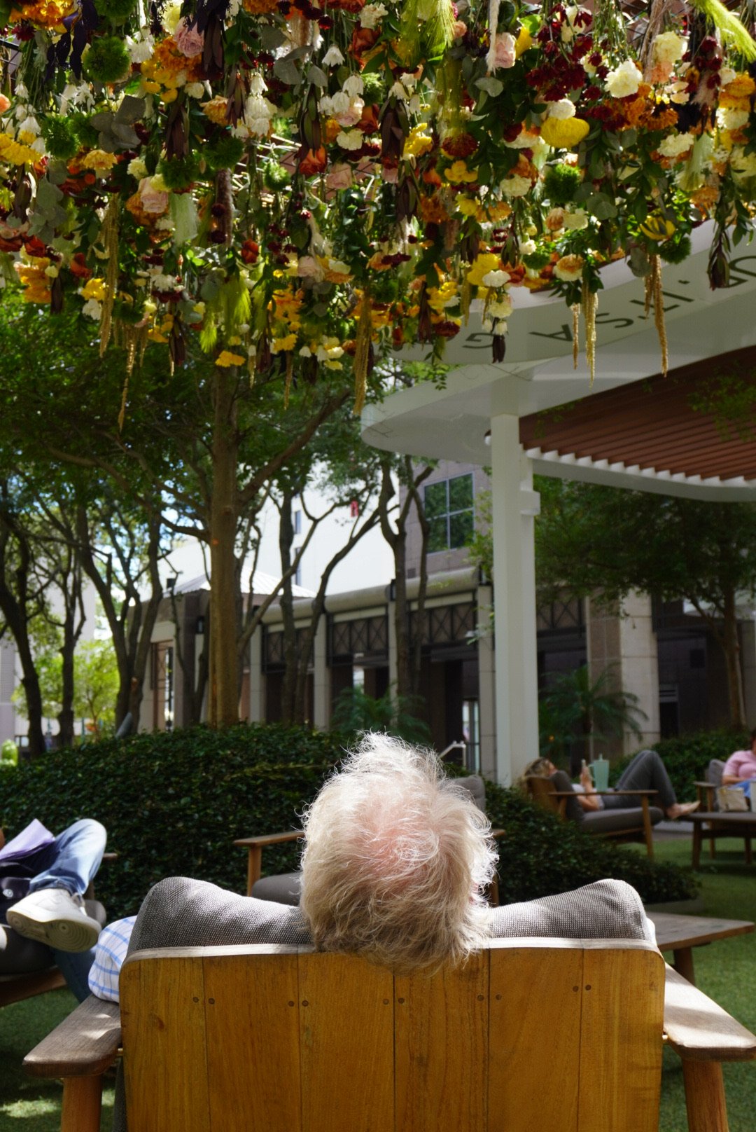 Laurie’s customers, Fernando and Kate embracing by the lake on their wedding day.