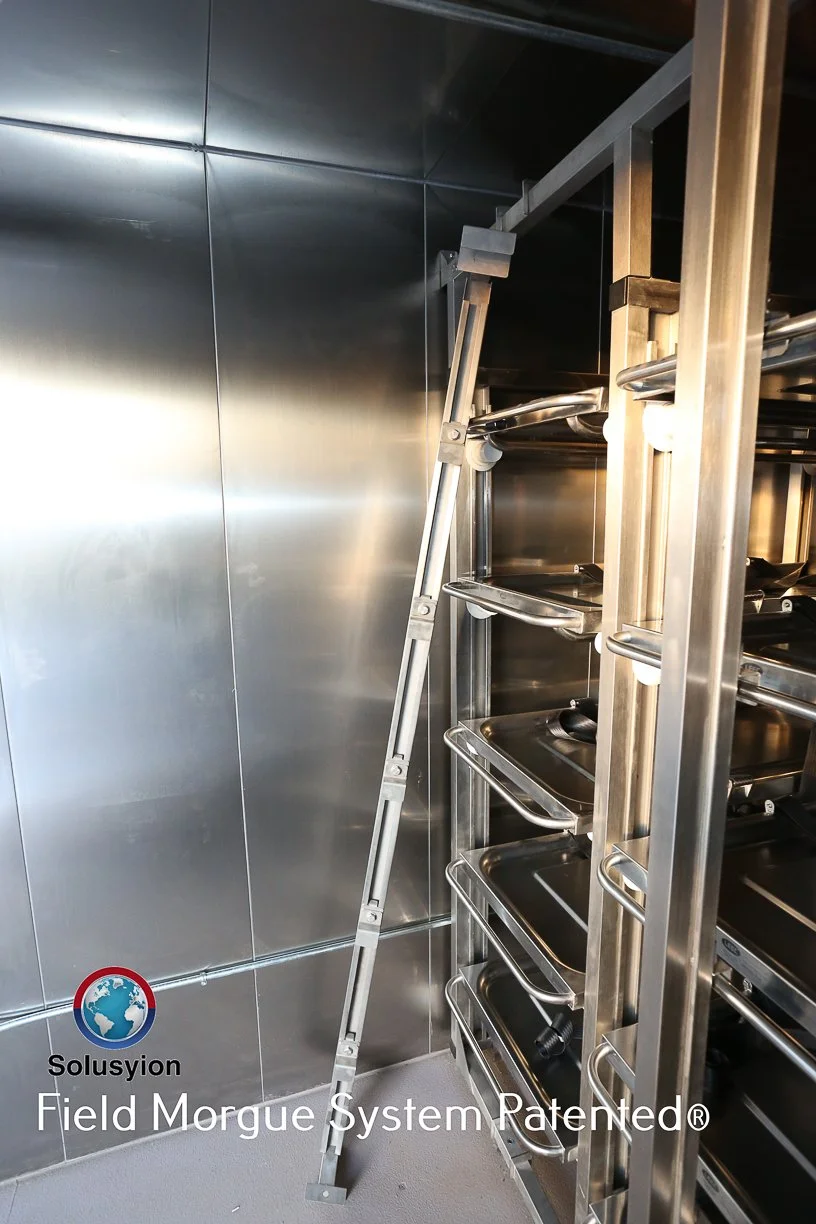 View of retention bar removed to show size and substance of retention system.