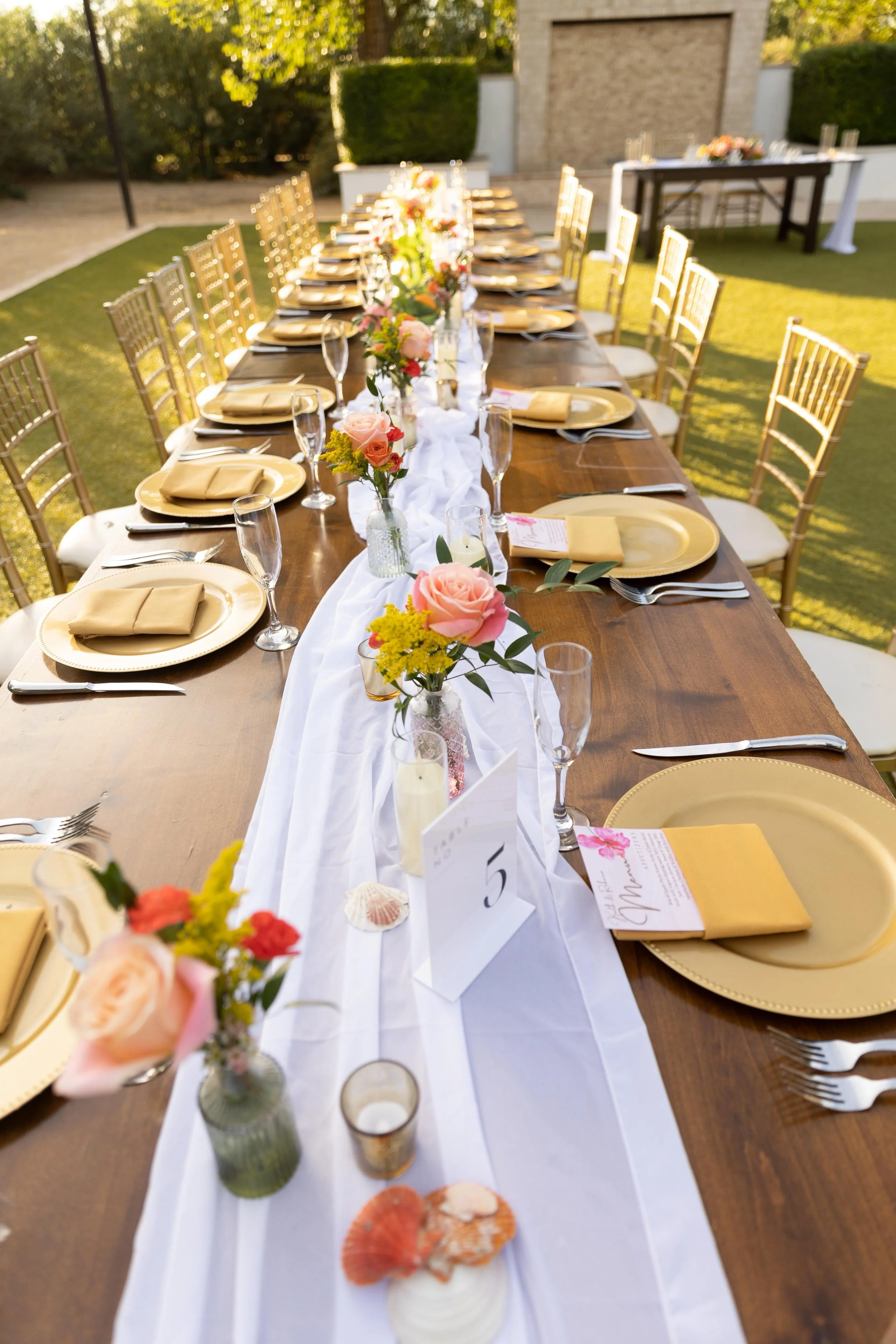 Rustic table setting at one of Laurie’s customers wedding.