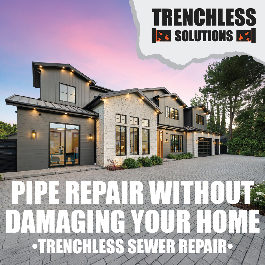A modern house with a paved driveway and trees in the background, featuring an advertisement for trenchless sewer repair by Trenchless Solutions.