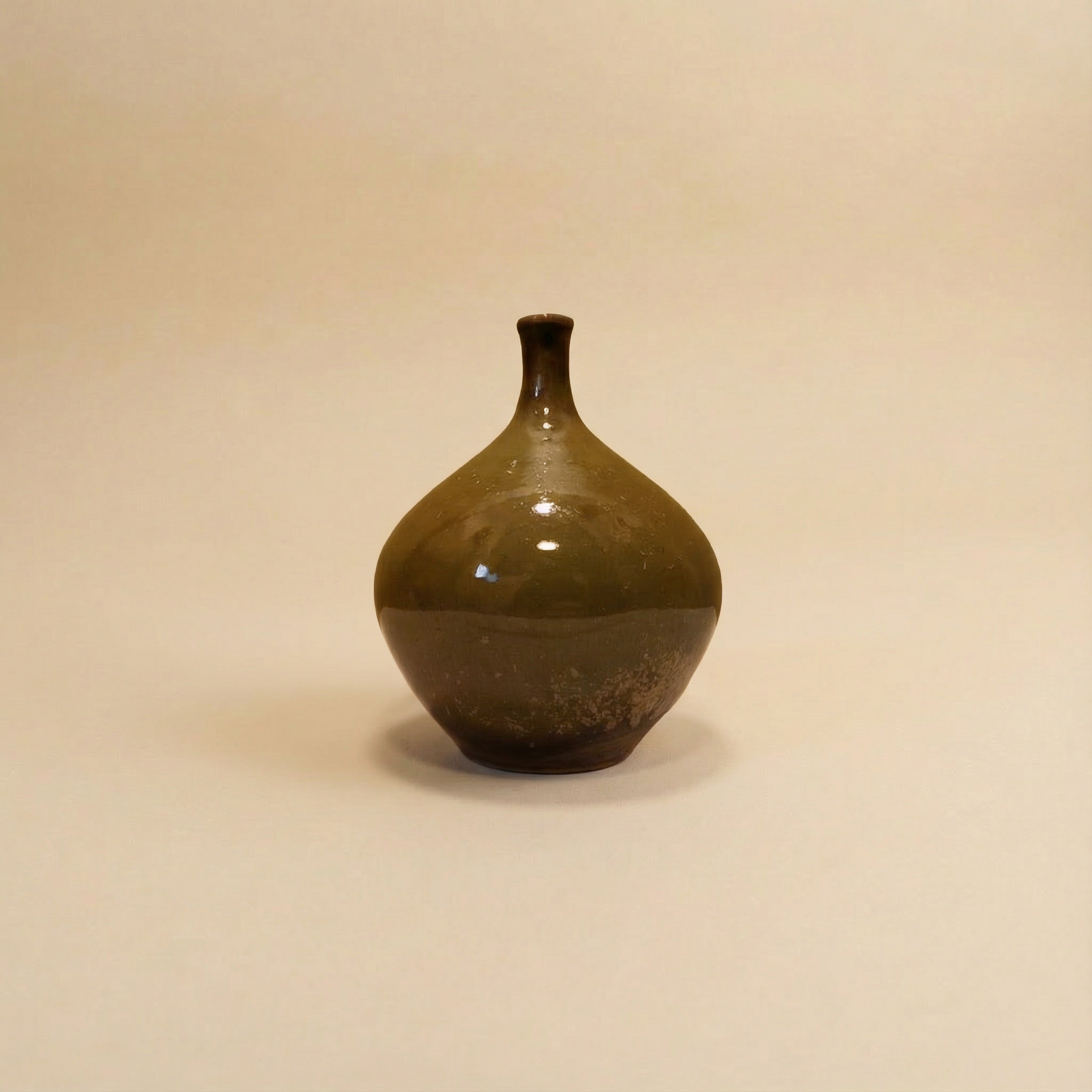 Miniature vase with spottet glaze. Sweden.