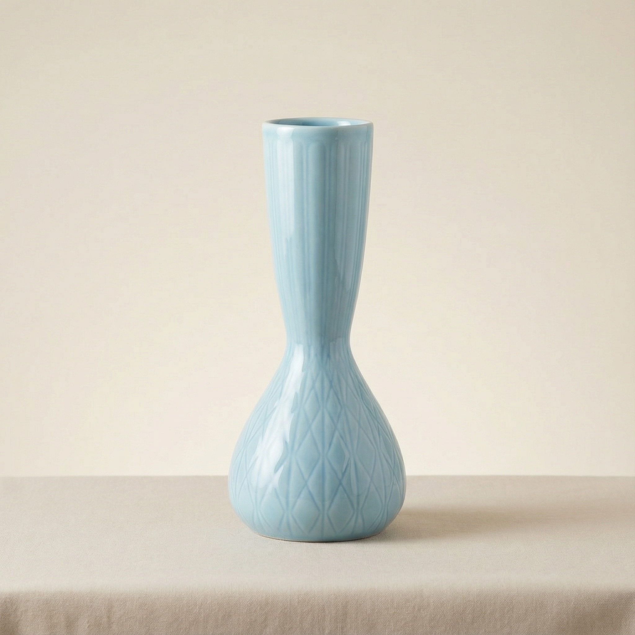 A joyful light blue ceramic vase by Rørstrand, Sweden.