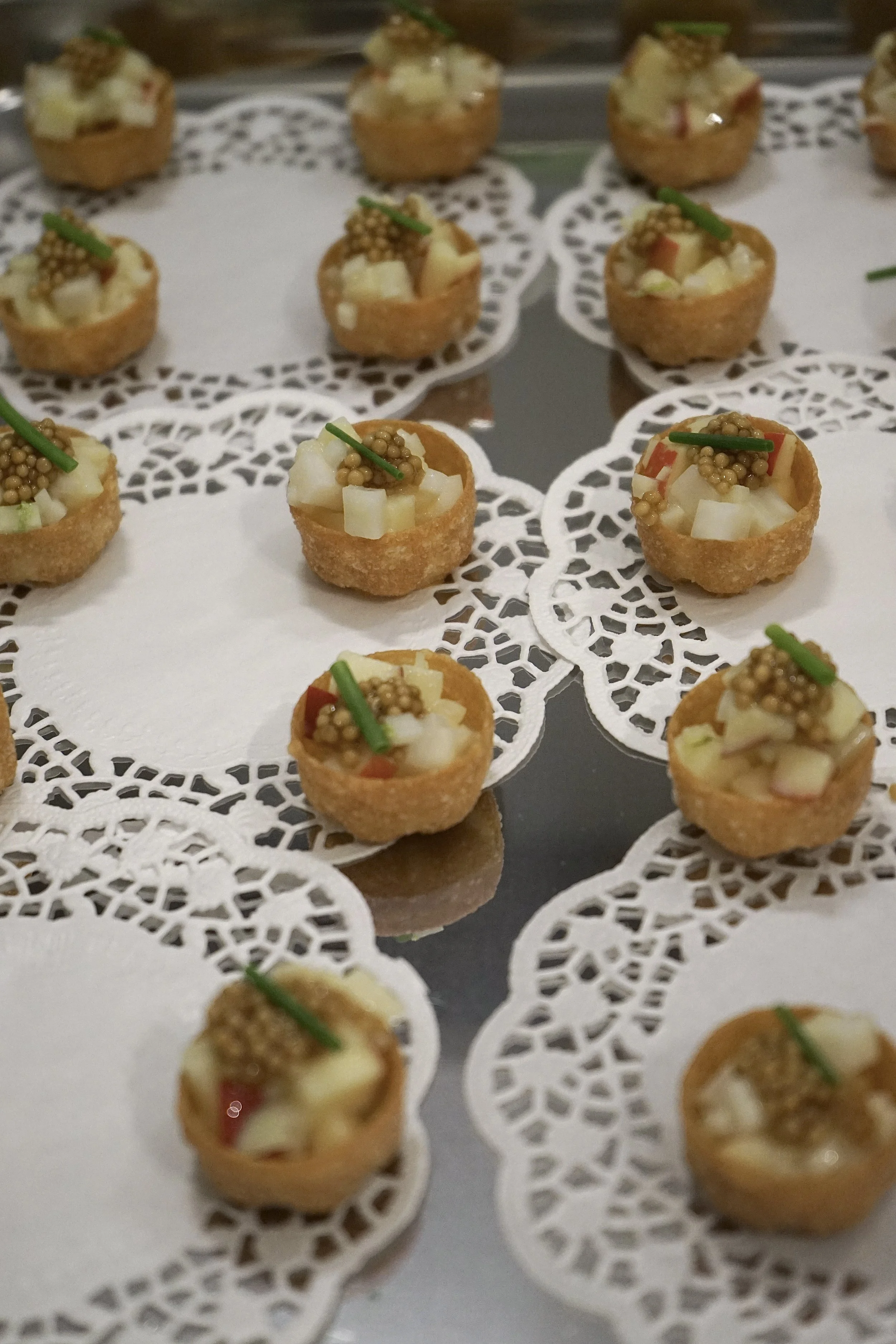 Canapé of apple, kohlrabi and pickled mustard seeds