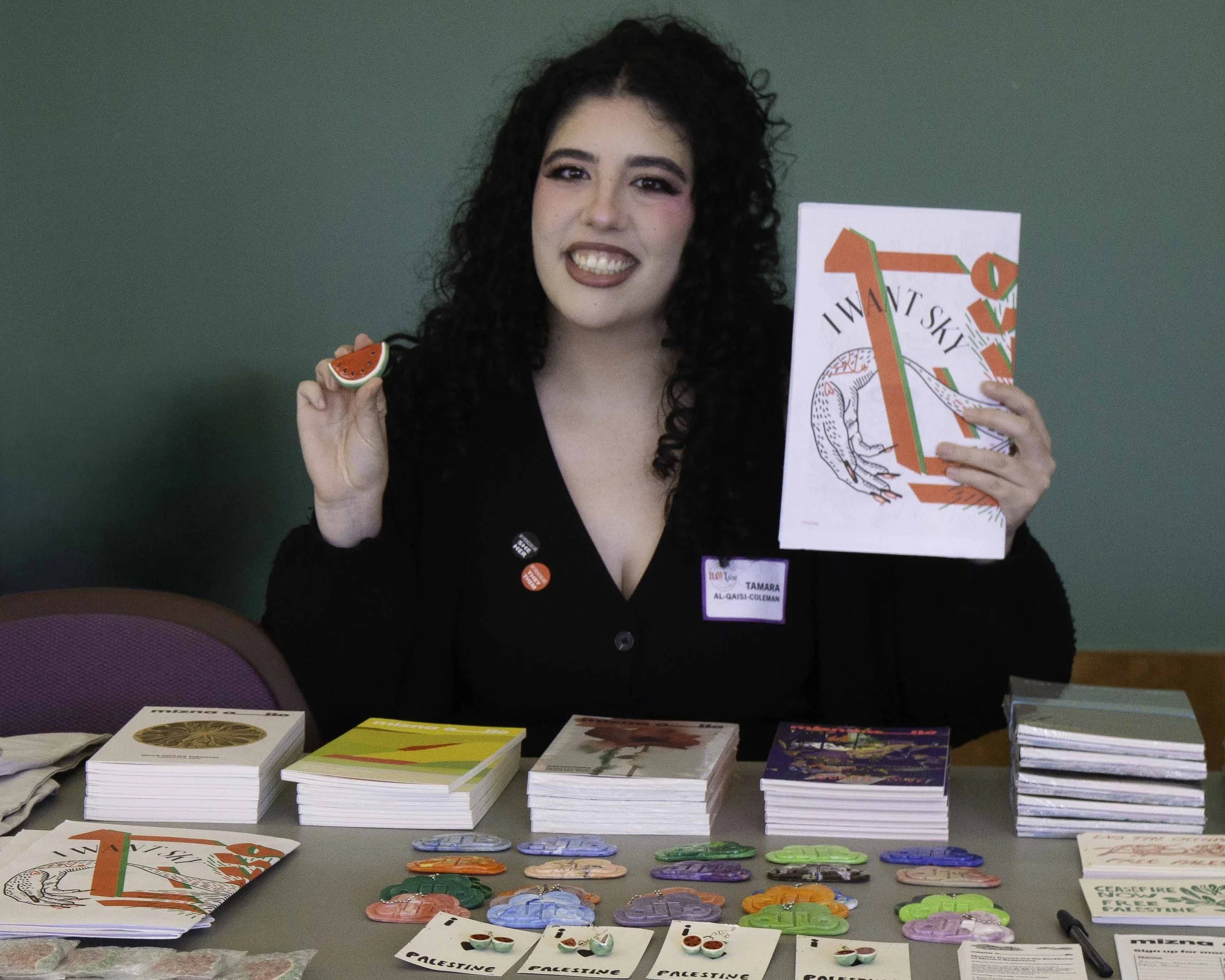 A conference table display of beautiful literary journals