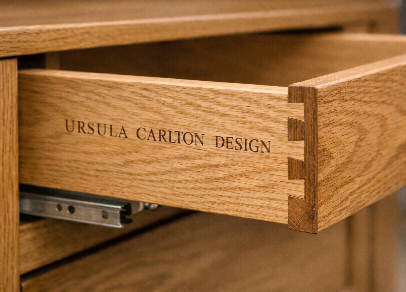 Custom dovetail drawer at Château, Dordogne designed by Ursula Carlton Design, featuring custom wood veneer cabinetry.