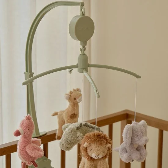 A baby crib mobile with plush animal toys including a pink flamingo, beige lion, gray elephant, and gray bunny hanging from a green arm.
