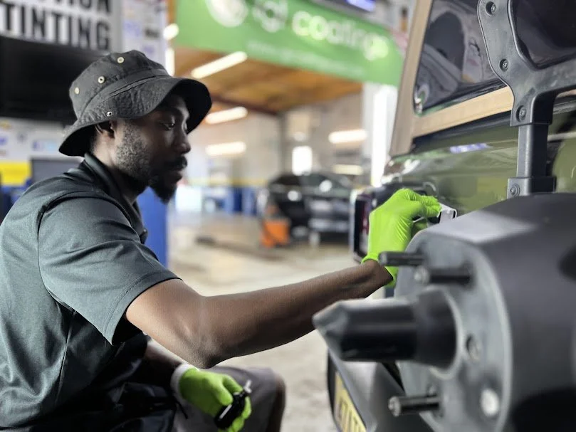 On the Spot Dealer Services creating professional vehicle labels and adendums for car dealerships nationwide.