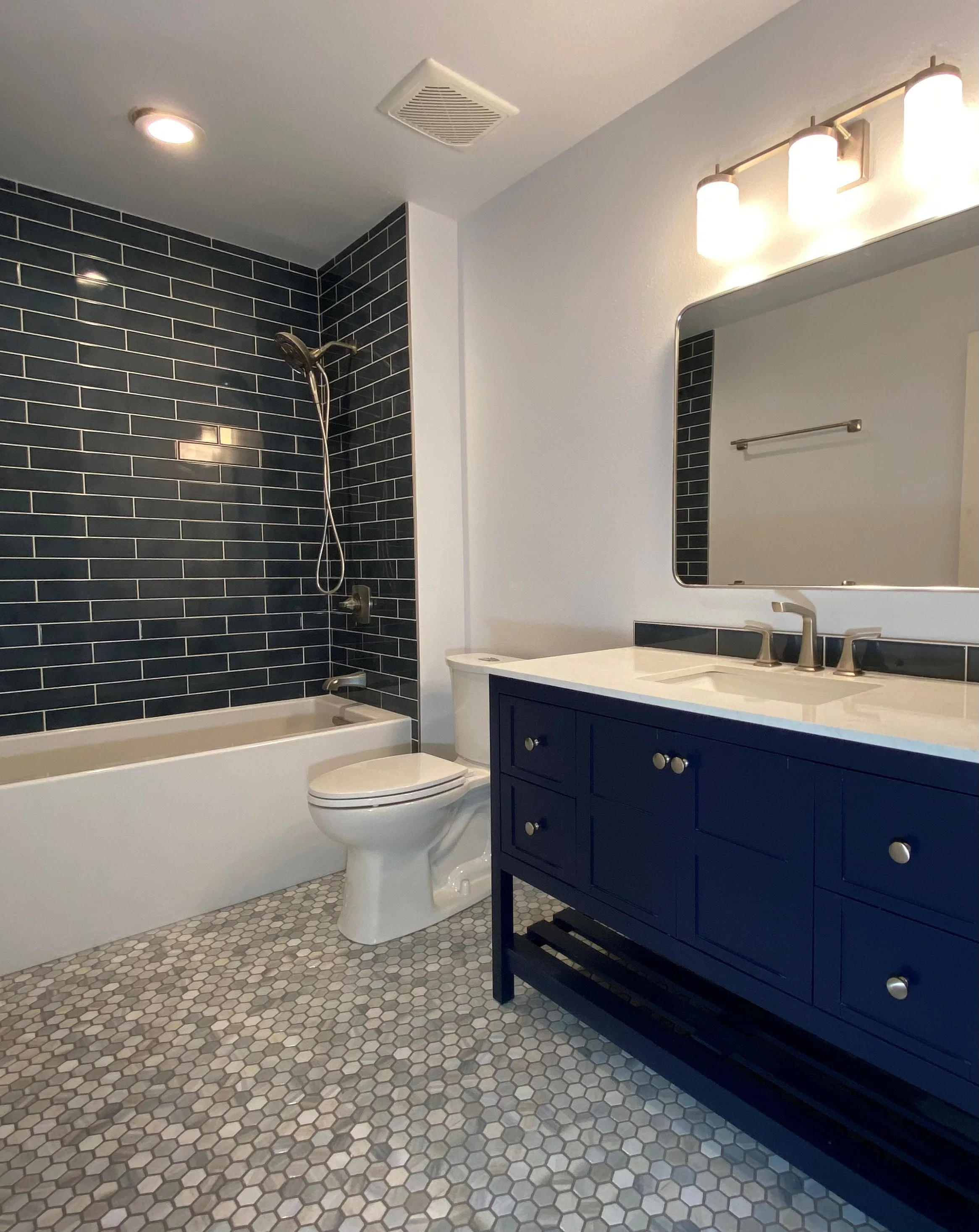 Subway Tile Shower, Penny Tile Floor.jpg