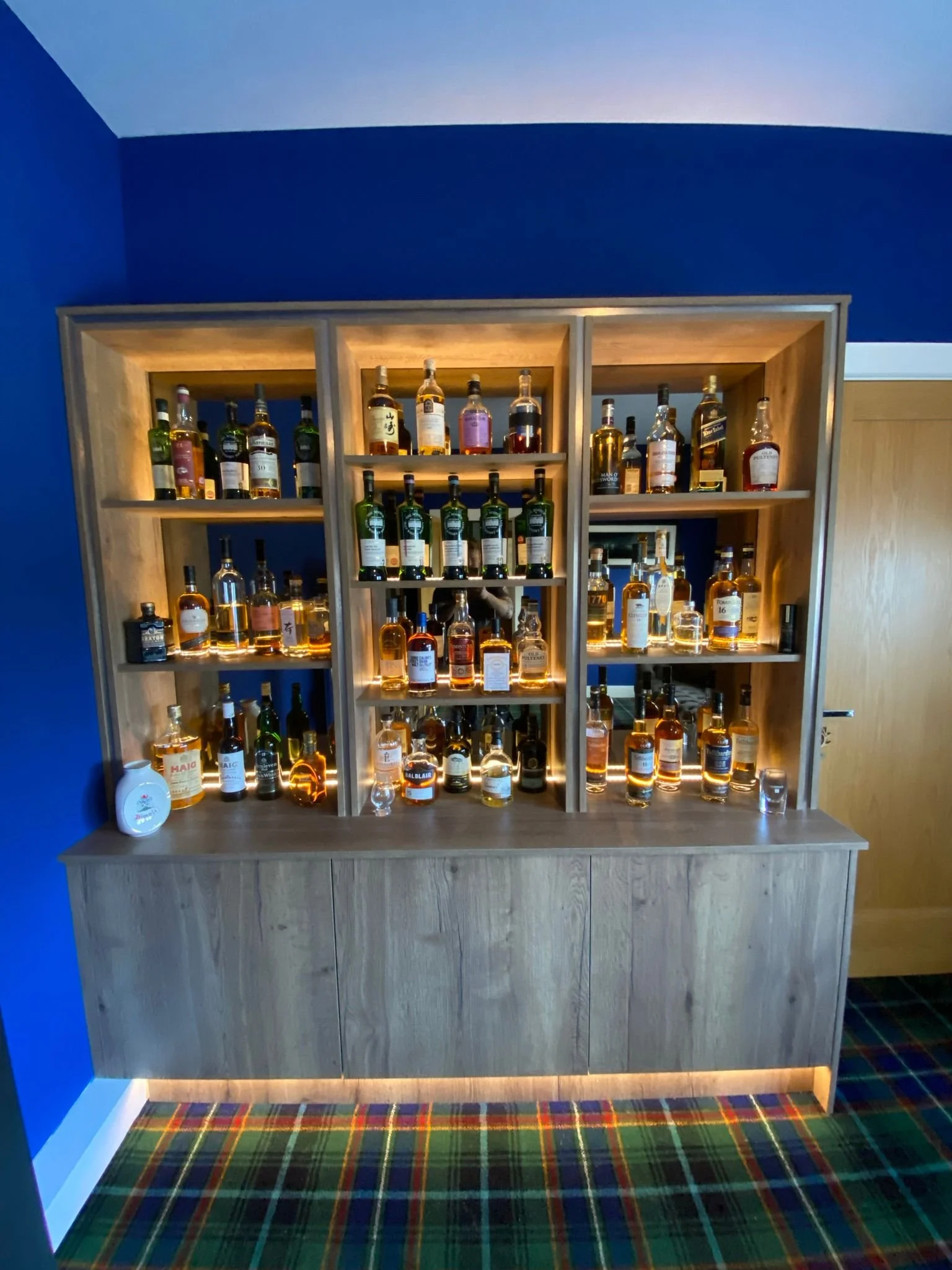 Home bar with display shelves and LED lighting