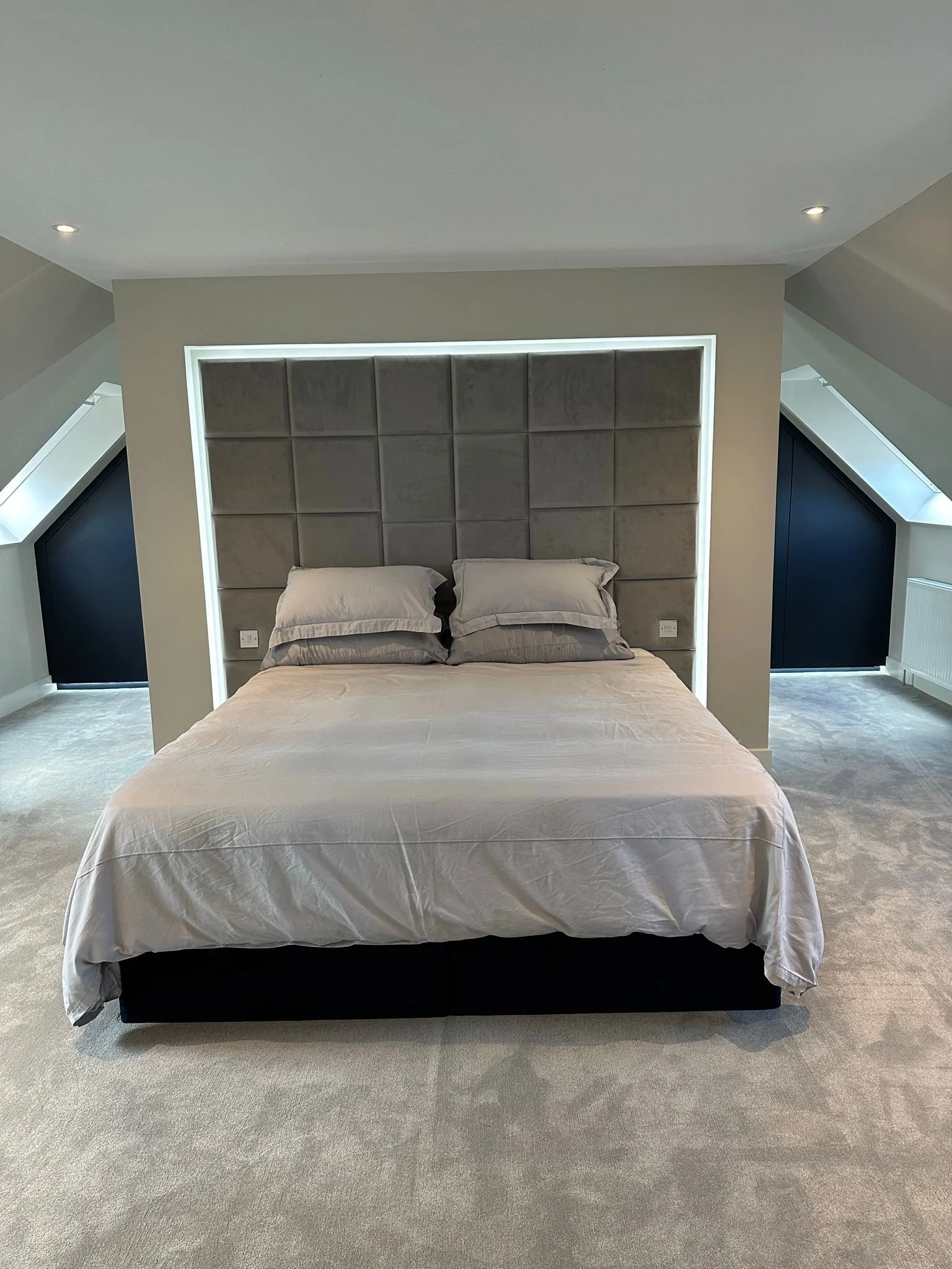 Eaves cupboards with diving wall and hand-made headboard. 