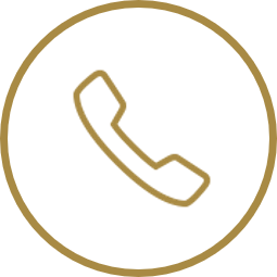 Icon of a telephone receiver inside a circular outline