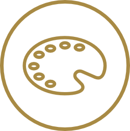 A gold art deco style paint palette icon inside a circle.