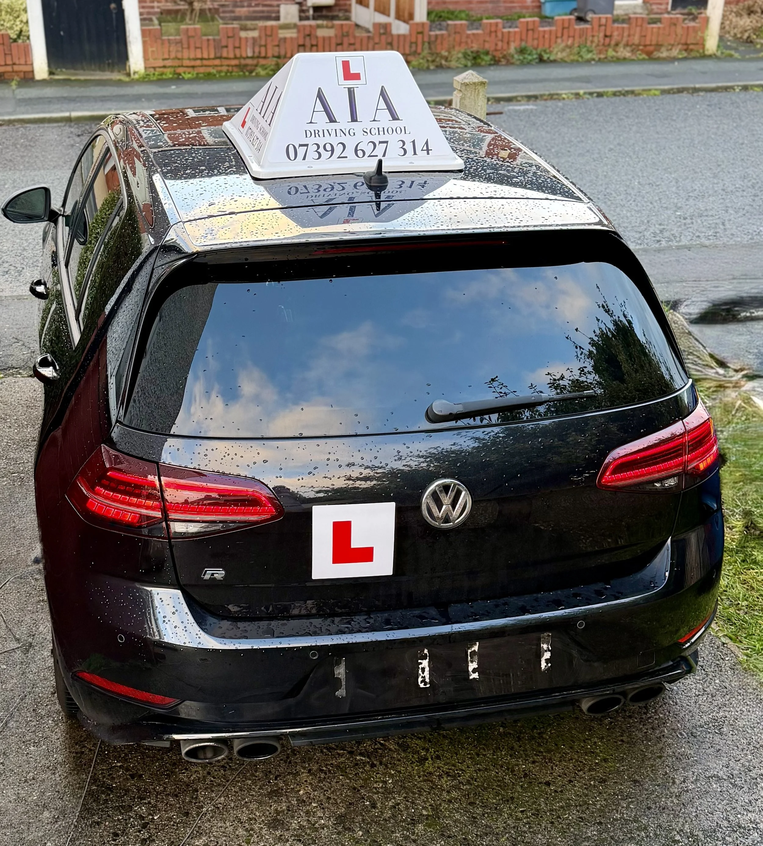Black Volkswagen car with a red