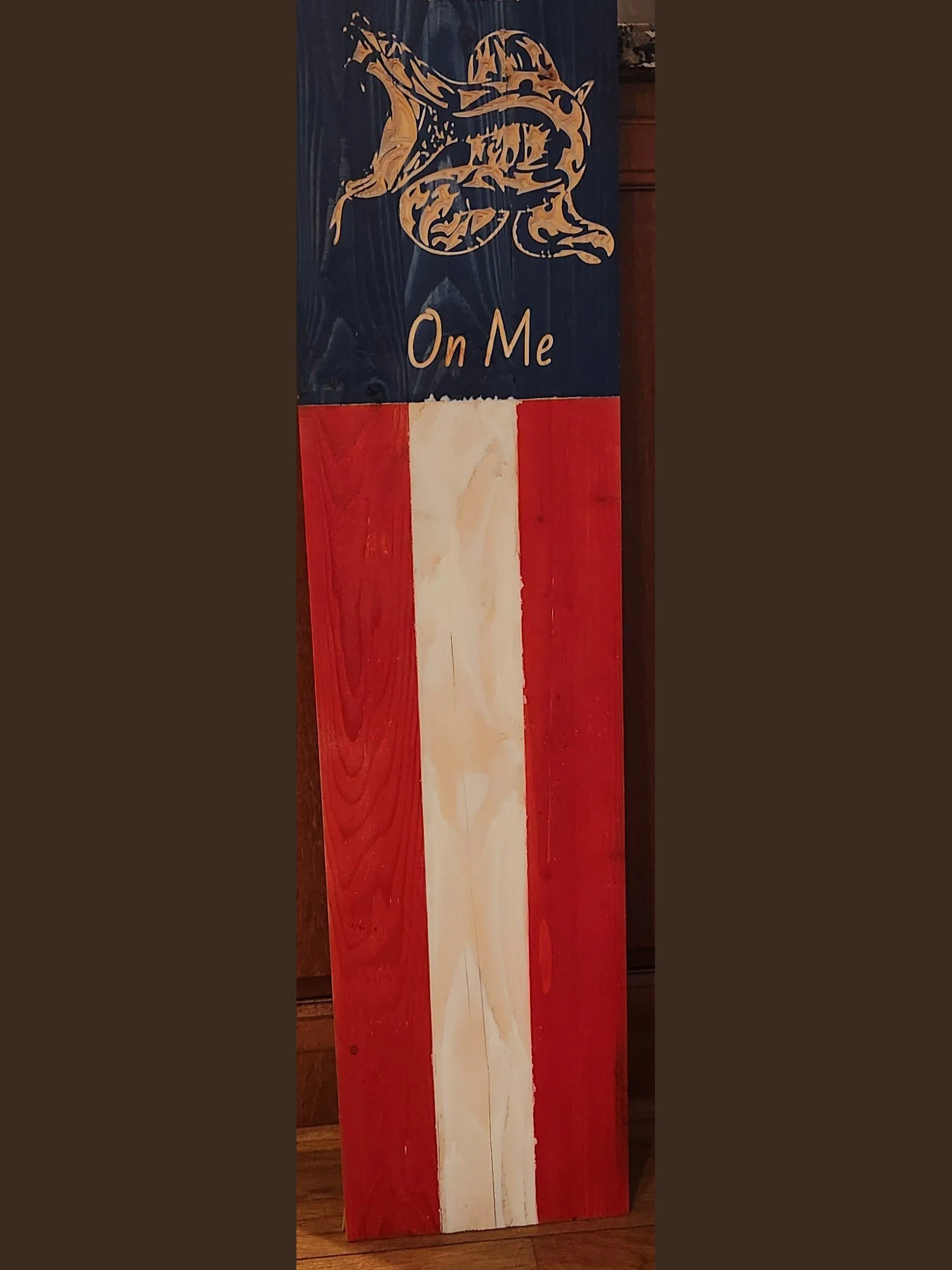 Don't Tread On Me flag sign: red, white and blue stained wood with a carved coiled rattlesnake, 9 x 24 inches.