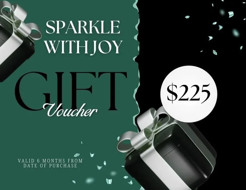 Gift voucher worth $225 with a dark green and black background, silver ribbons, and confetti.