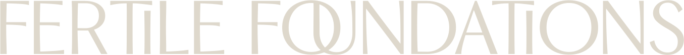 Close-up of a sign that reads 'FERTILE FOUNDATIONS' in large white text on a dark background.