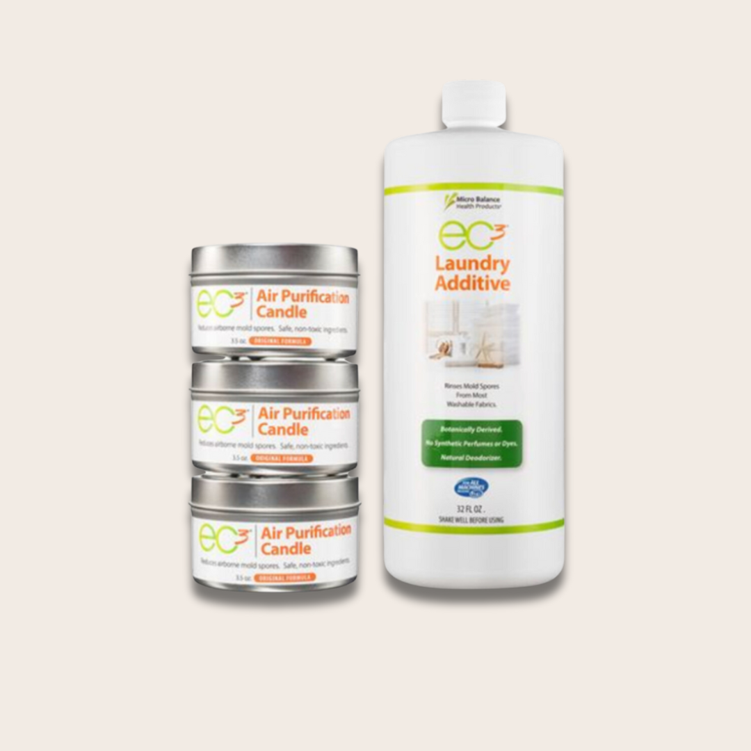 Three small containers of air purification candles and a large bottle of laundry additive on a beige background.