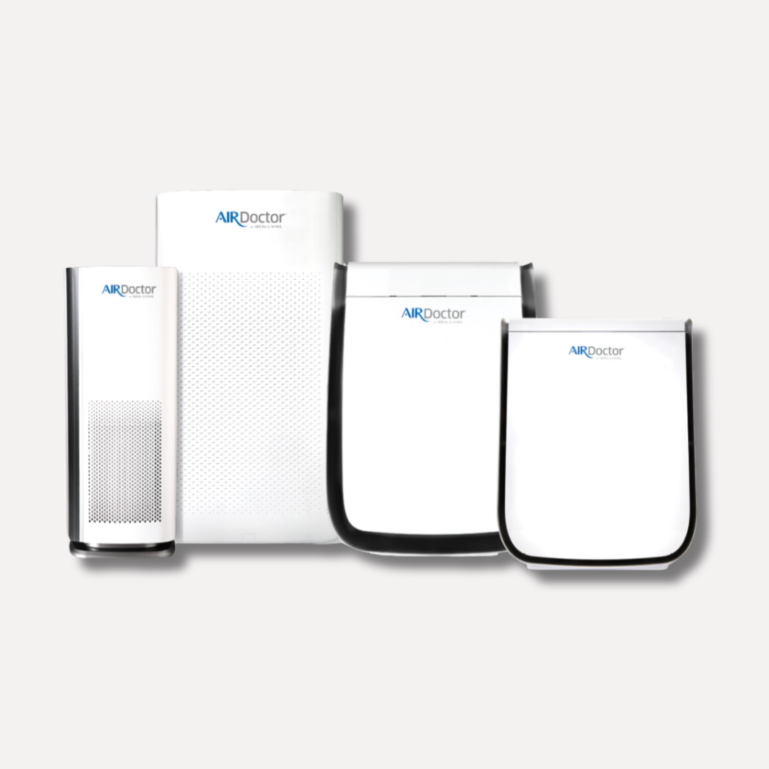 A set of five white air purifiers with different sizes and shapes, branded 'AIR Doctor', placed on a light gray background.