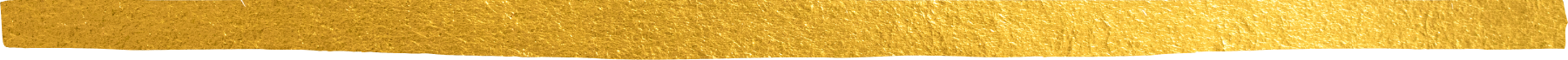 Close-up of a gold-colored textured surface, likely a ribbon or decorative strip.