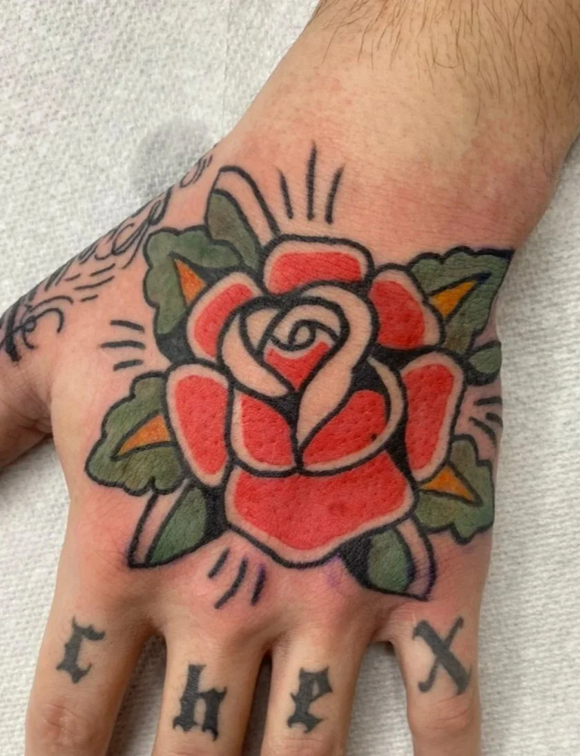 Colored Rose on Hand