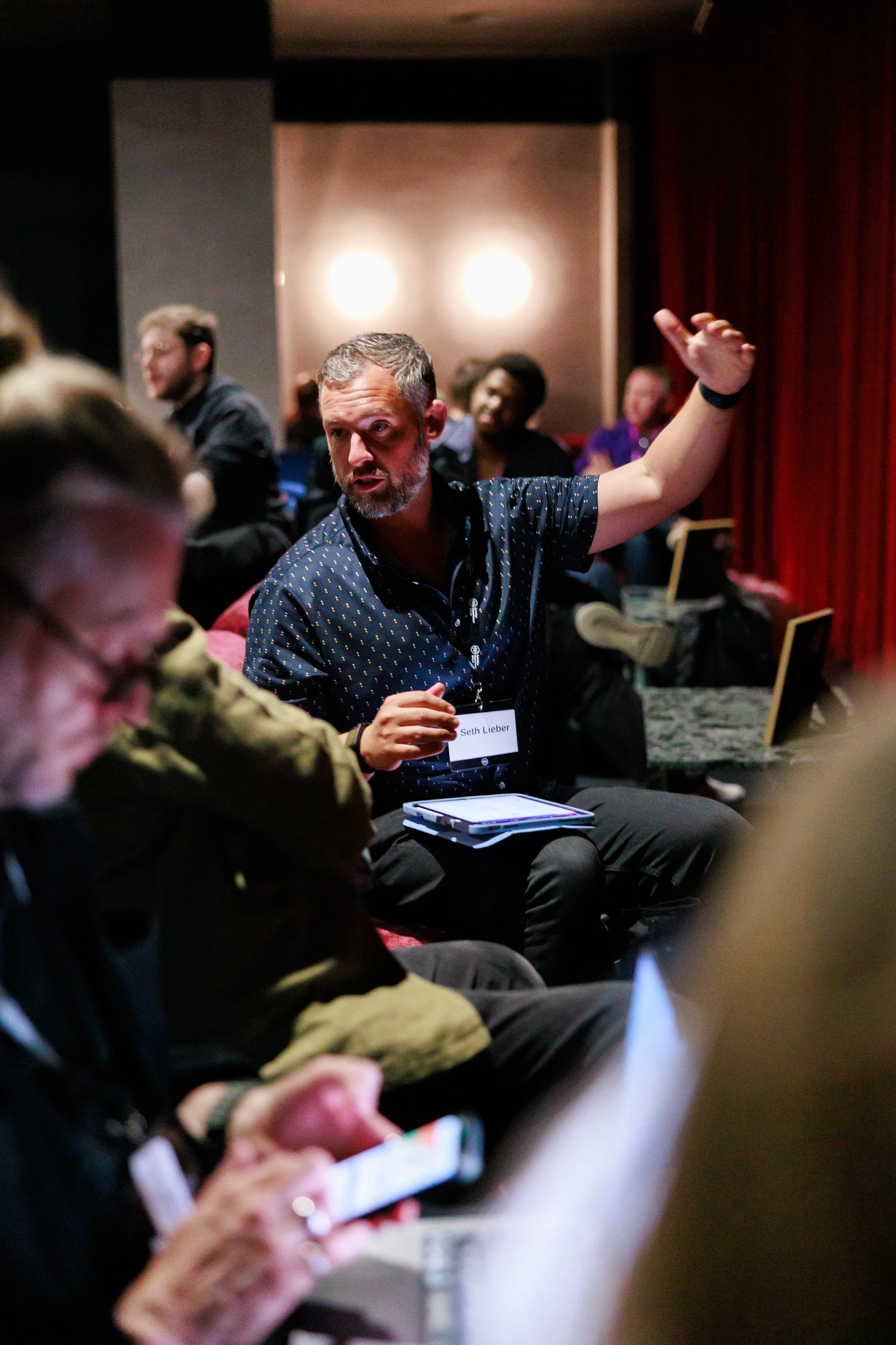 Seth Lieber facilitating a group discussion during an experience design workshop.