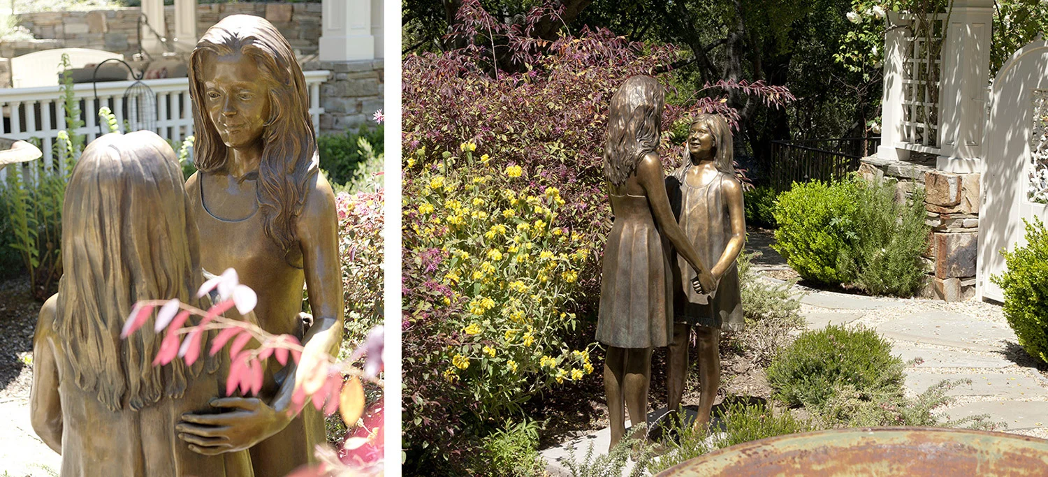 New bronze of their young ladies installed in their garden in full view of their living room and sun room