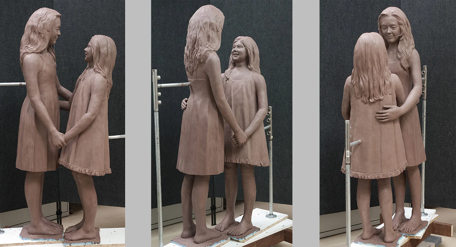 The clay artwork from 3 different angles.