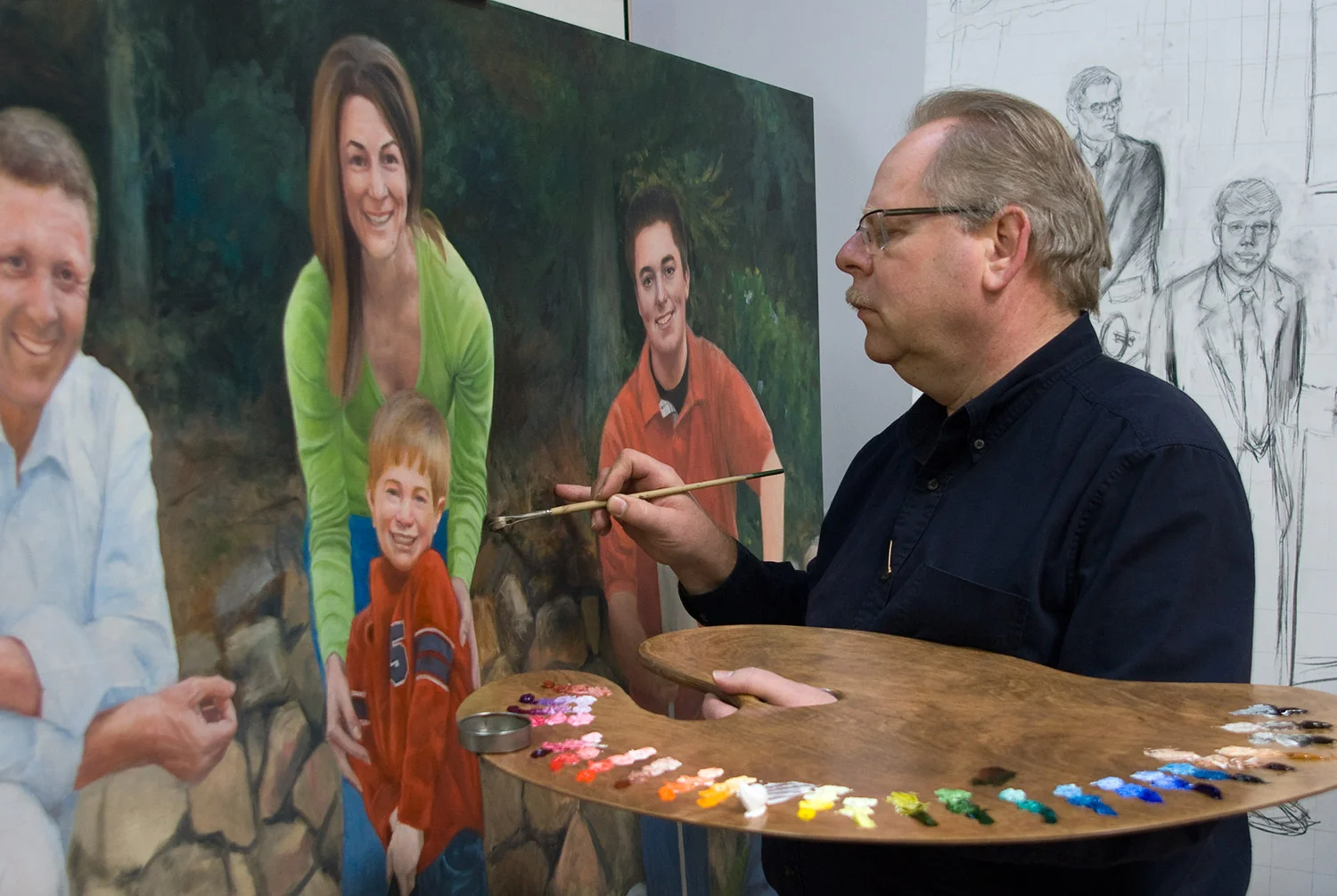 Terry Guyer working on the Moquin Family Portrait 48x72" oil on linen.