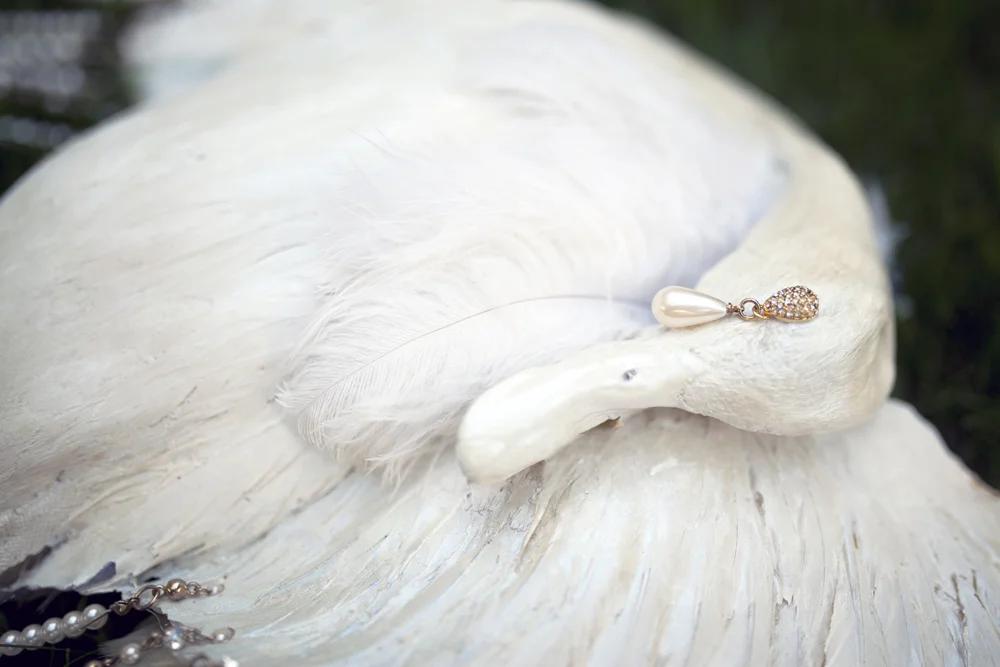 “Lion Heart” - Resin-cast neckpiece of duck with jewelry