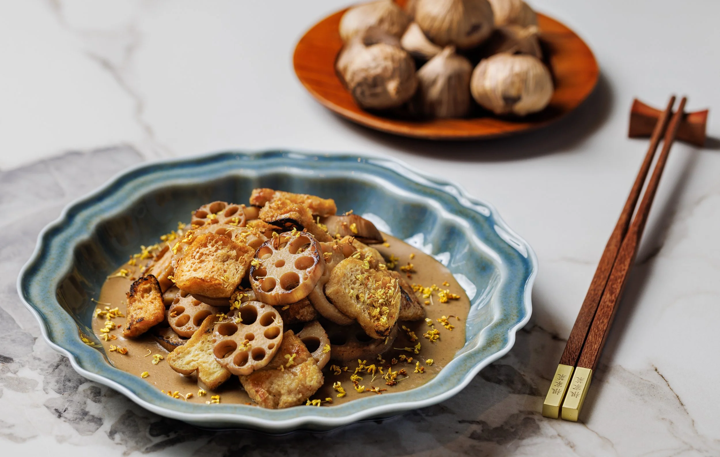 Wok Fried Lotus Roos with Black Garlic Sauce