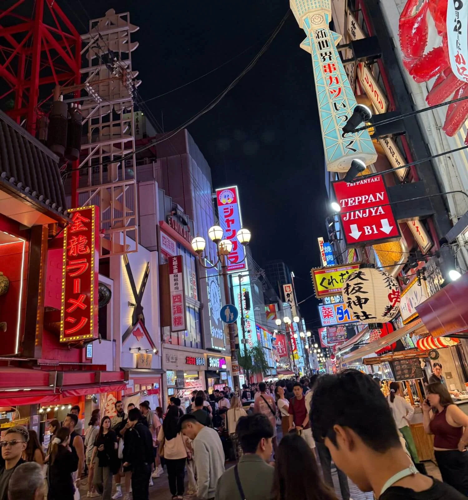 Crowded street at night in Dotonbori in Osaka, Japan.