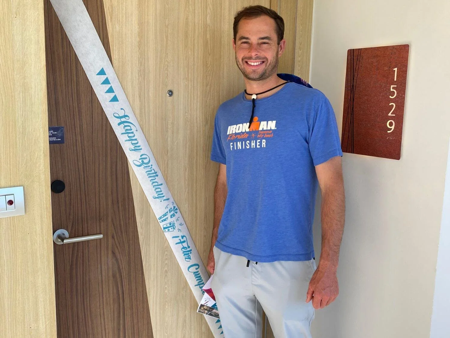 Man with a birthday sign on his hotel door at Hyatt Ziva Cap Cana in the Dominican Republic.