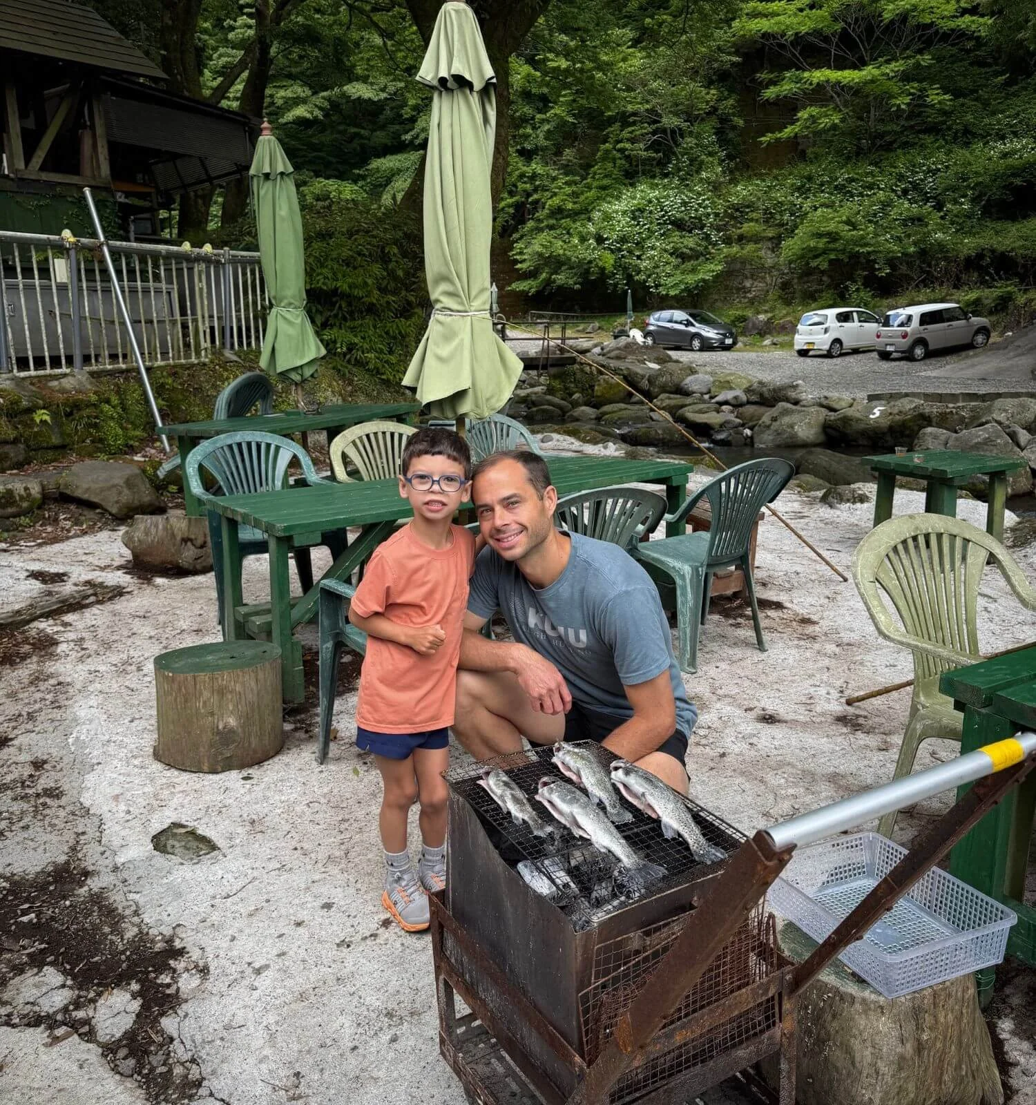 Matt and Jackson grilling the trout they caught in Hakone